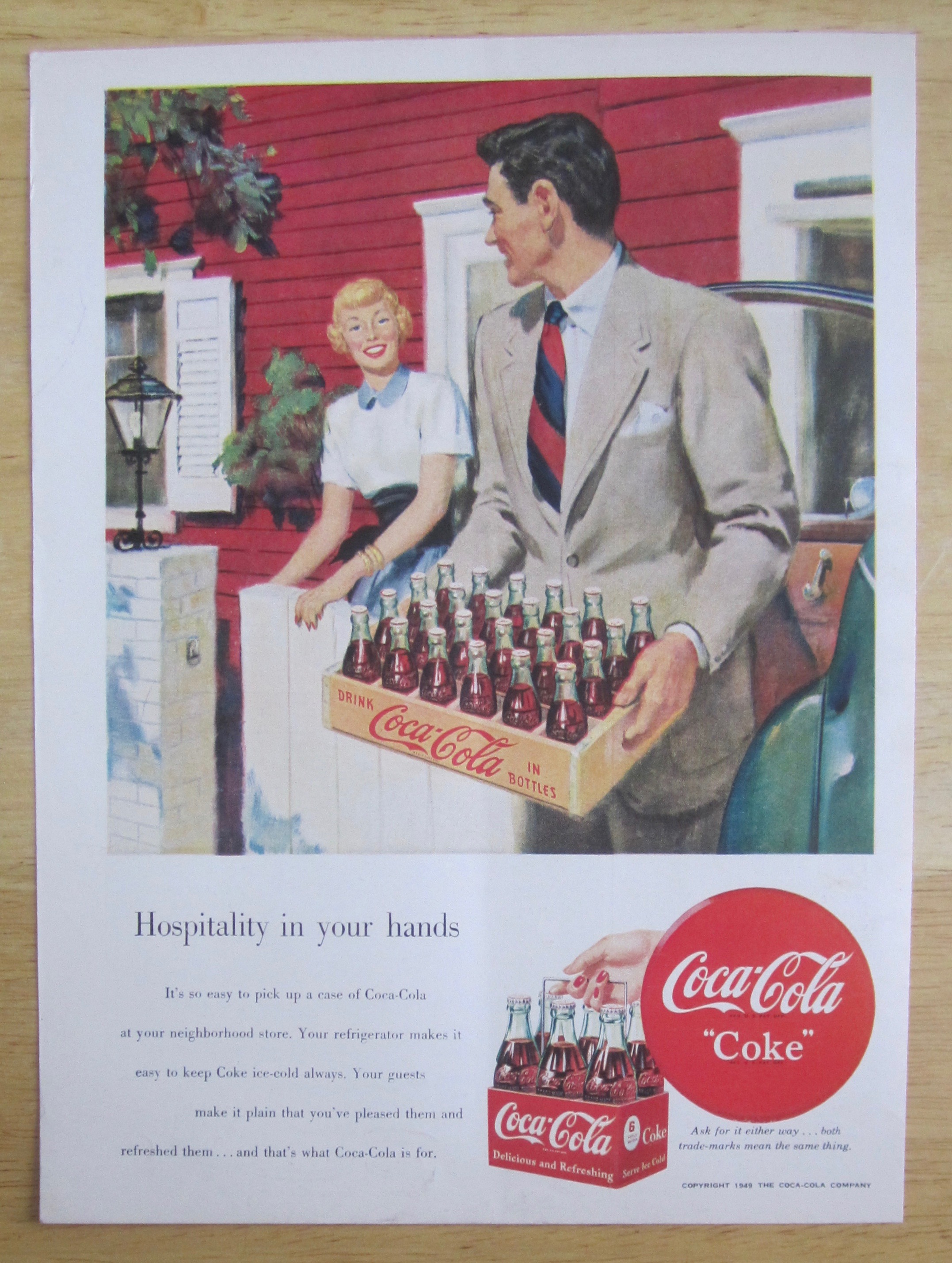 1950 Coca Cola (Coke) with Man Carrying a Case of Coke