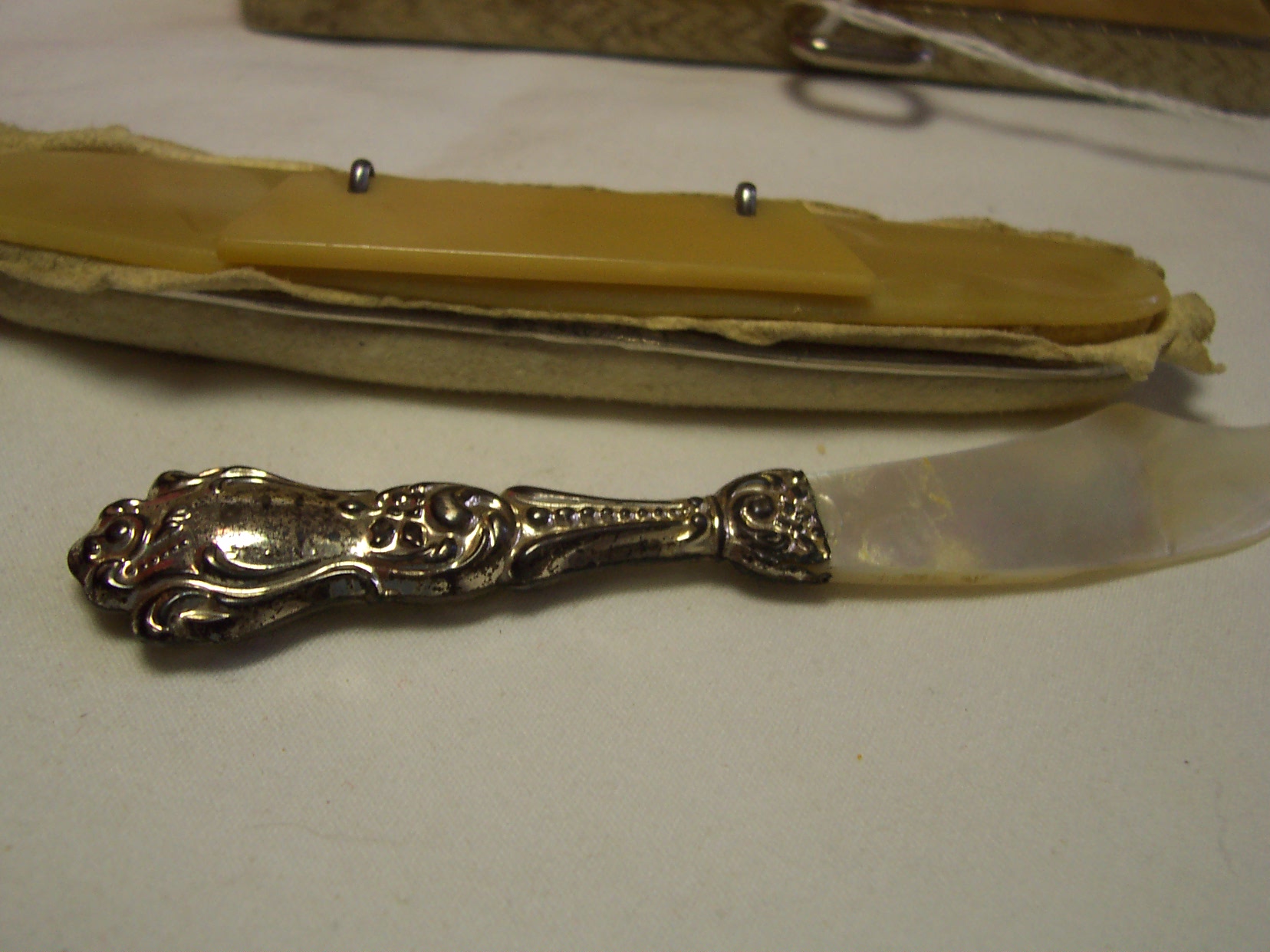 Bakelite Nail Buffer in case with sword