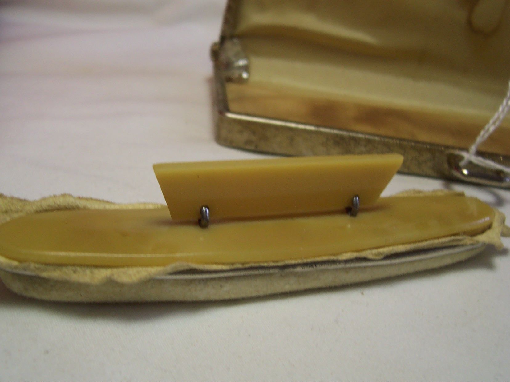 Bakelite Nail Buffer in case with sword