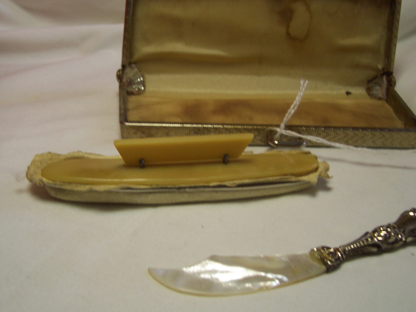 Bakelite Nail Buffer in case with sword
