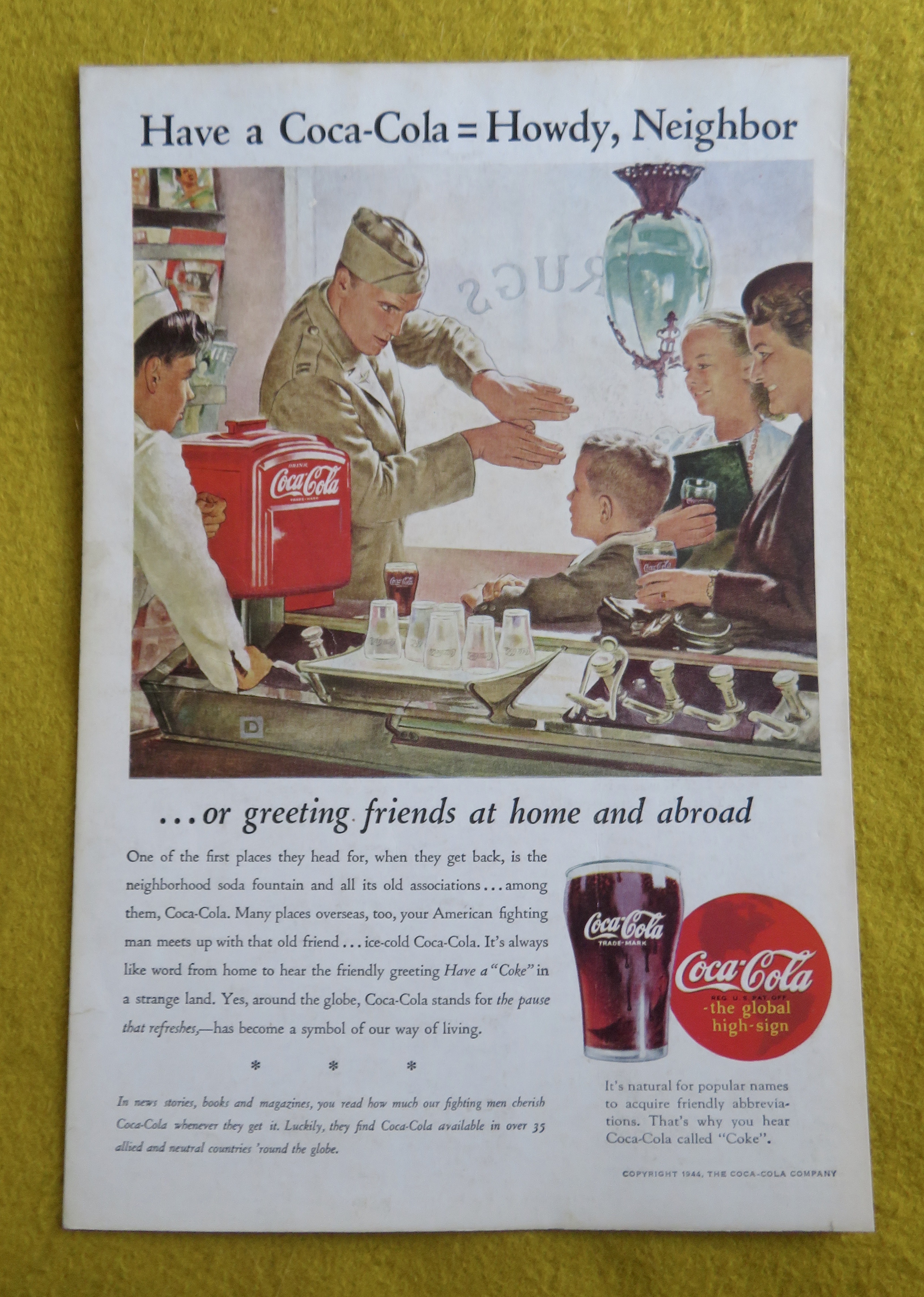 1944 Coca Cola (Coke) with a Soldier Talking to a Boy
