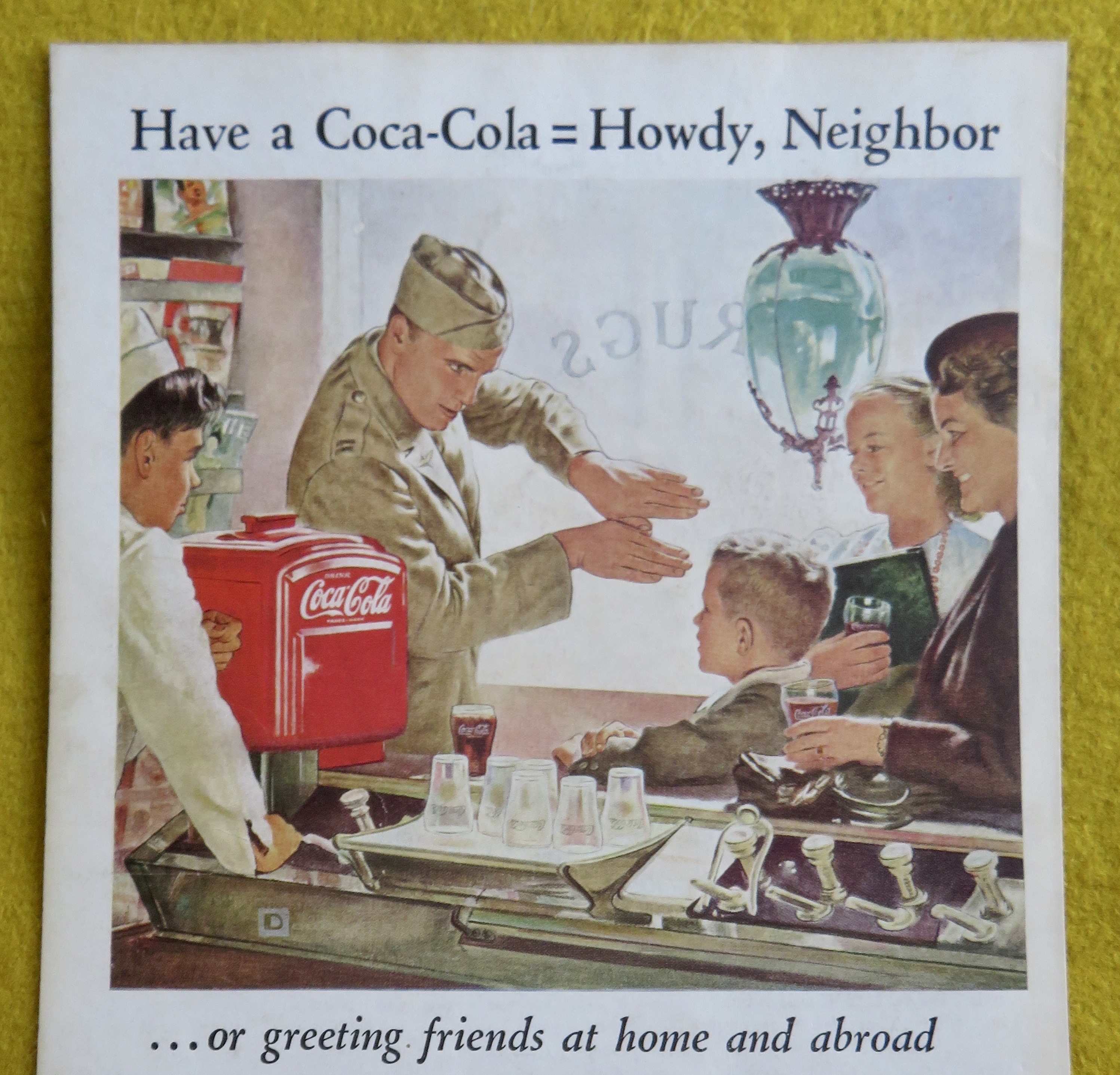 1944 Coca Cola (Coke) with a Soldier Talking to a Boy