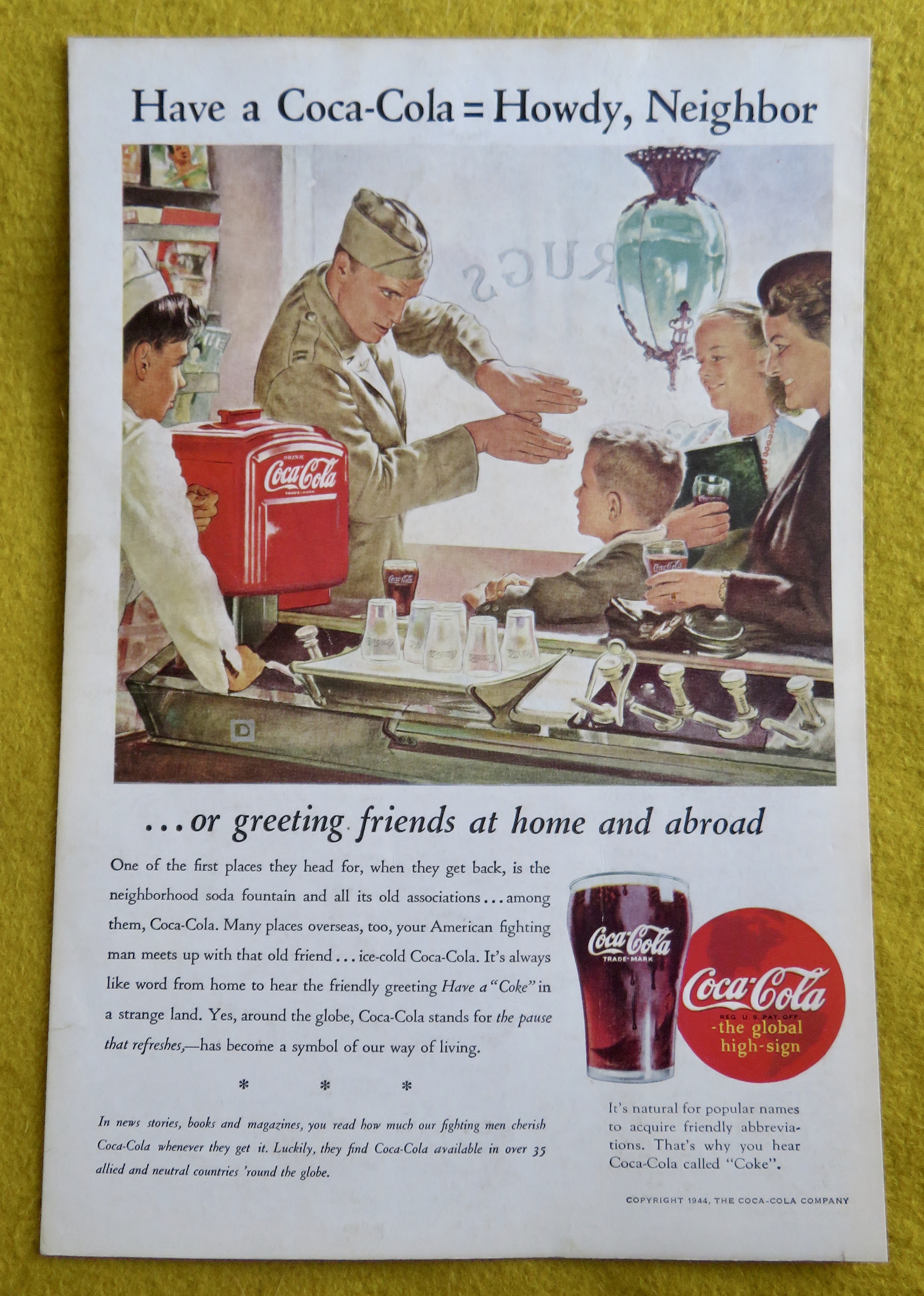 1944 Coca Cola (Coke) with a Soldier Talking to a Boy