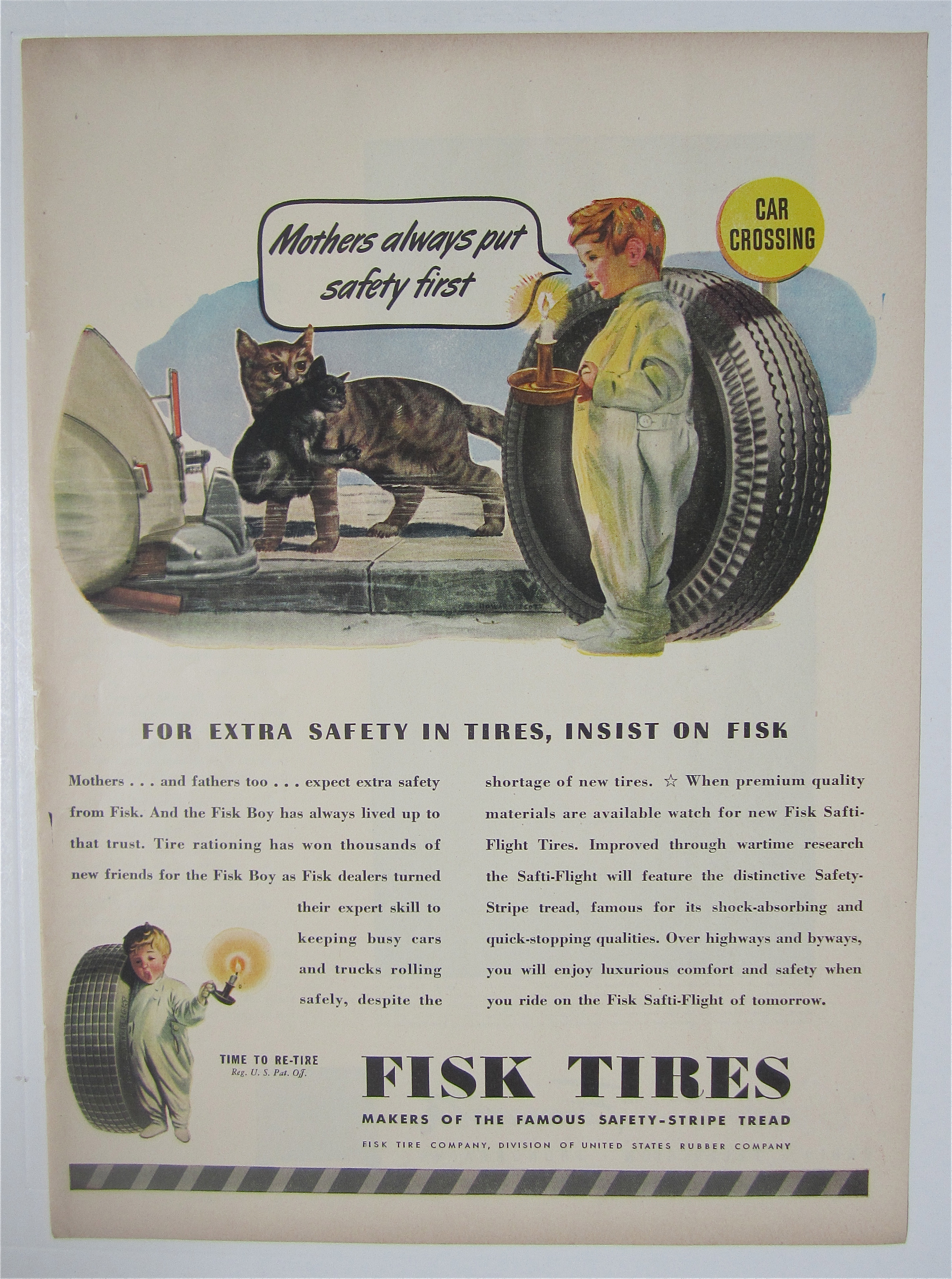 1945 Fisk Tires with Little Boy Looking at Cats