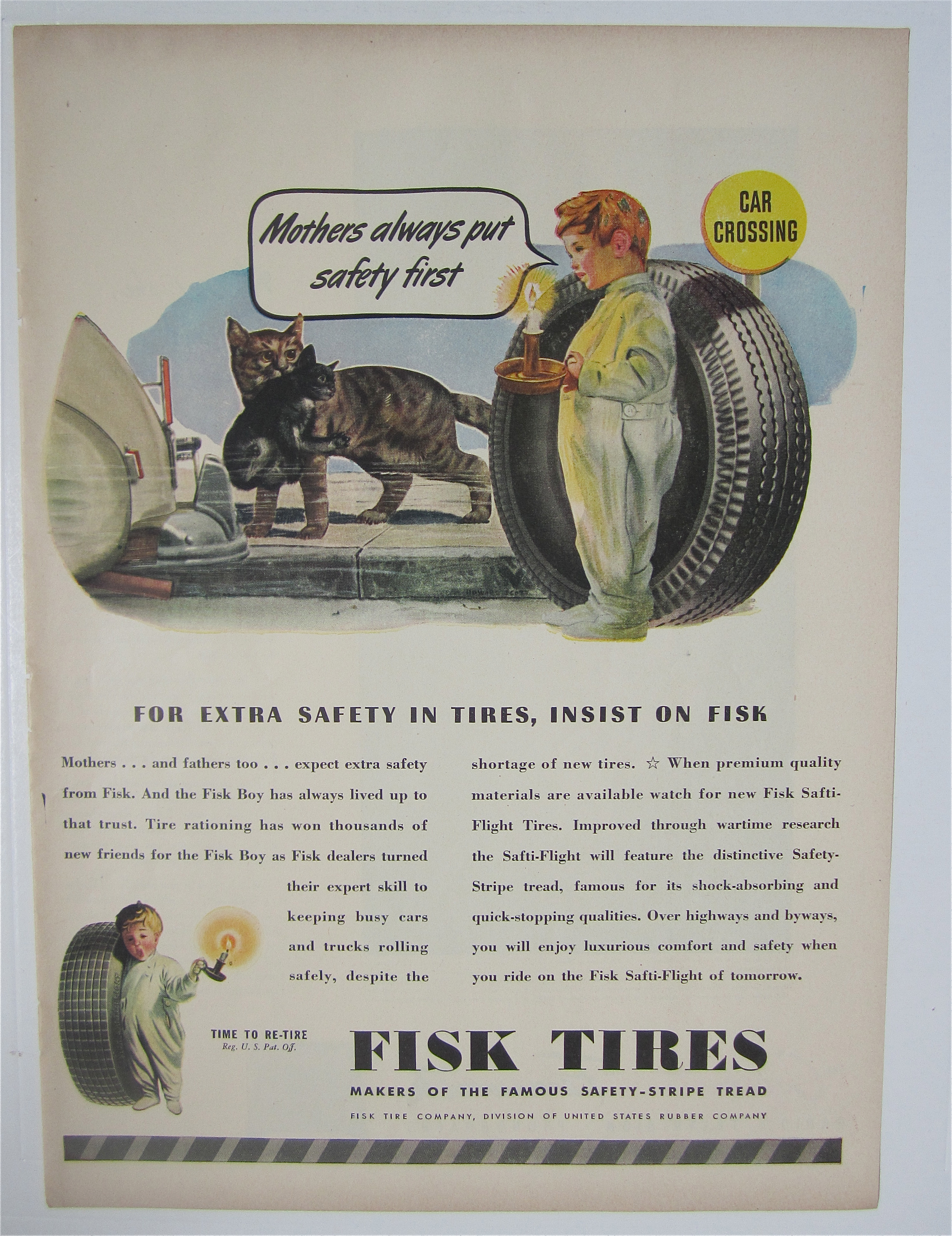 1945 Fisk Tires with Little Boy Looking at Cats