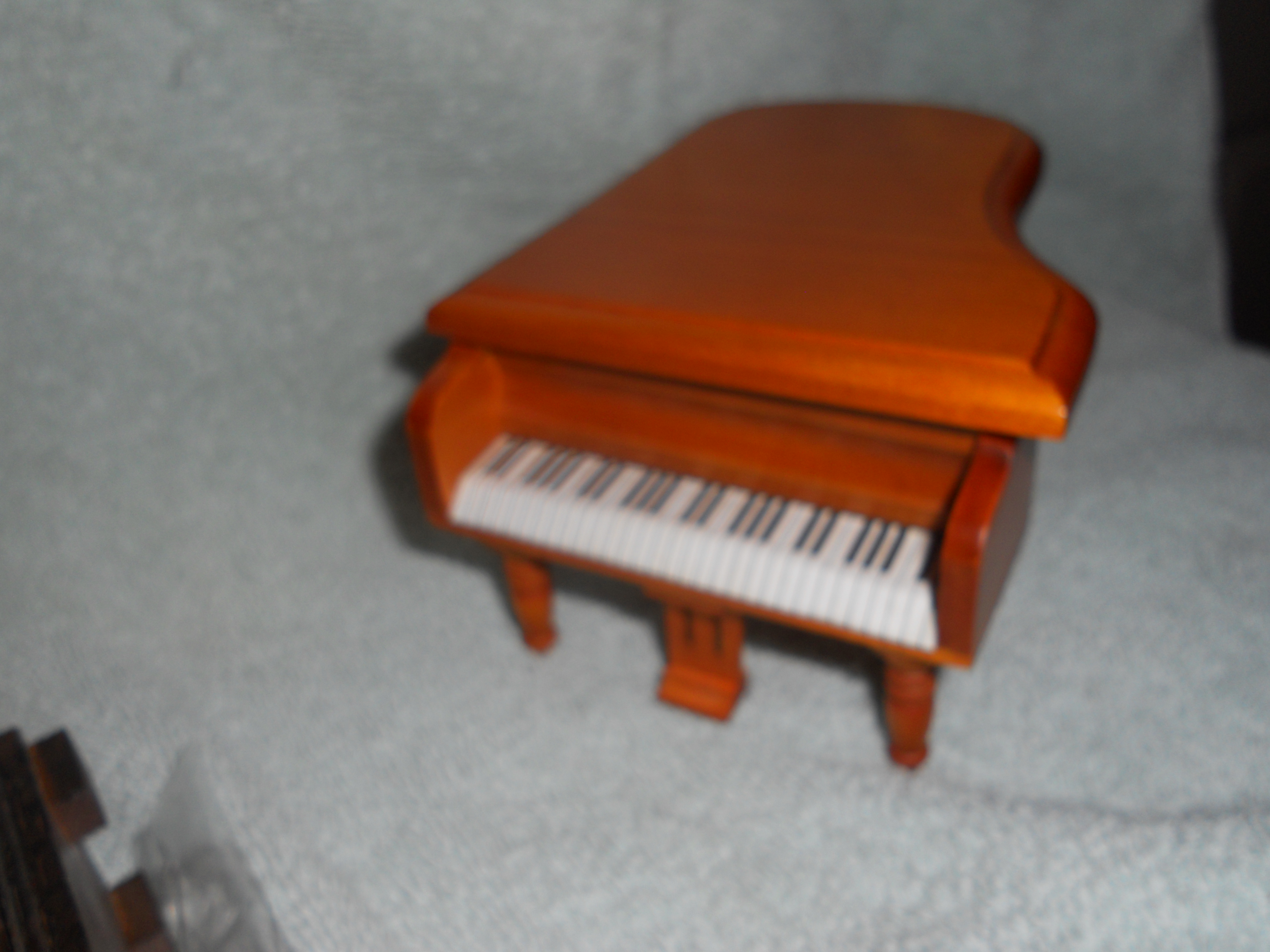 Doll House wood grand piano