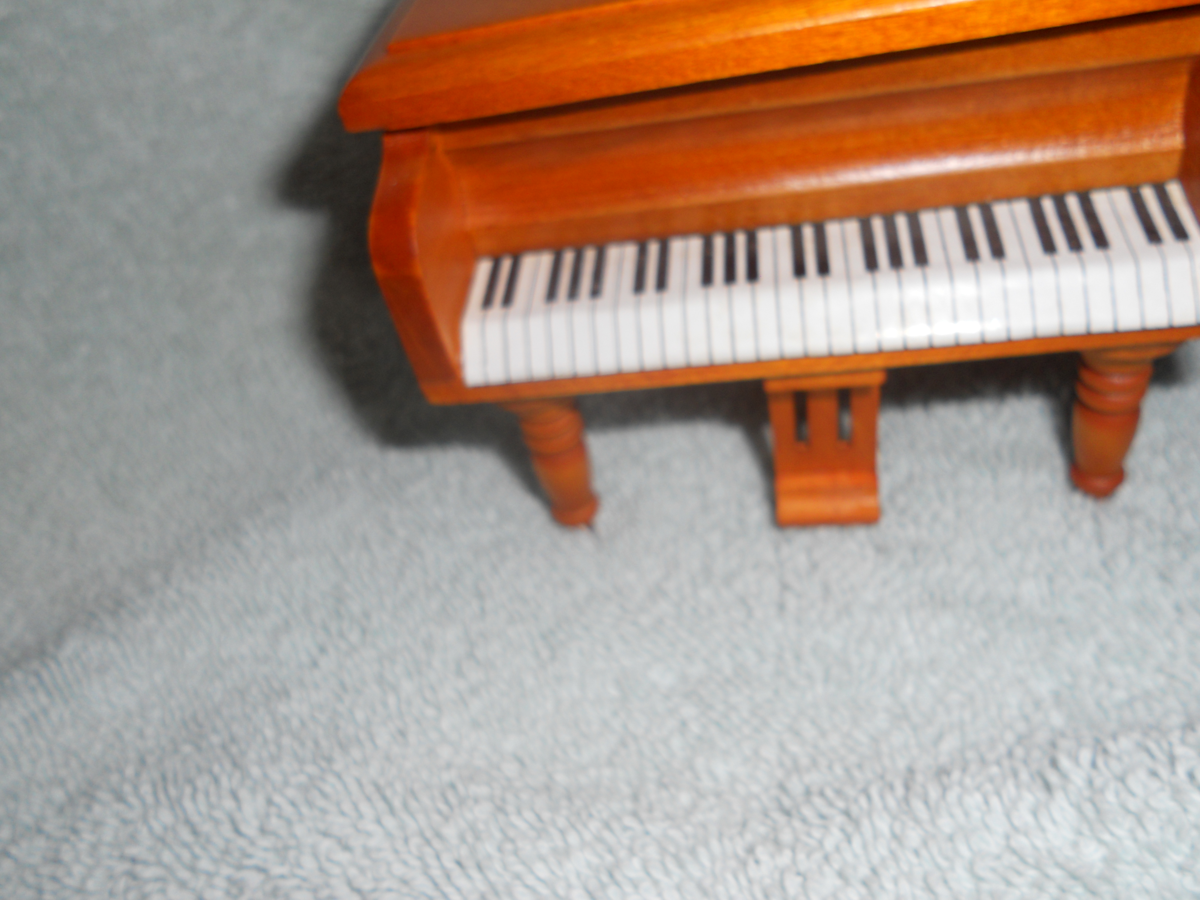 Doll House wood grand piano