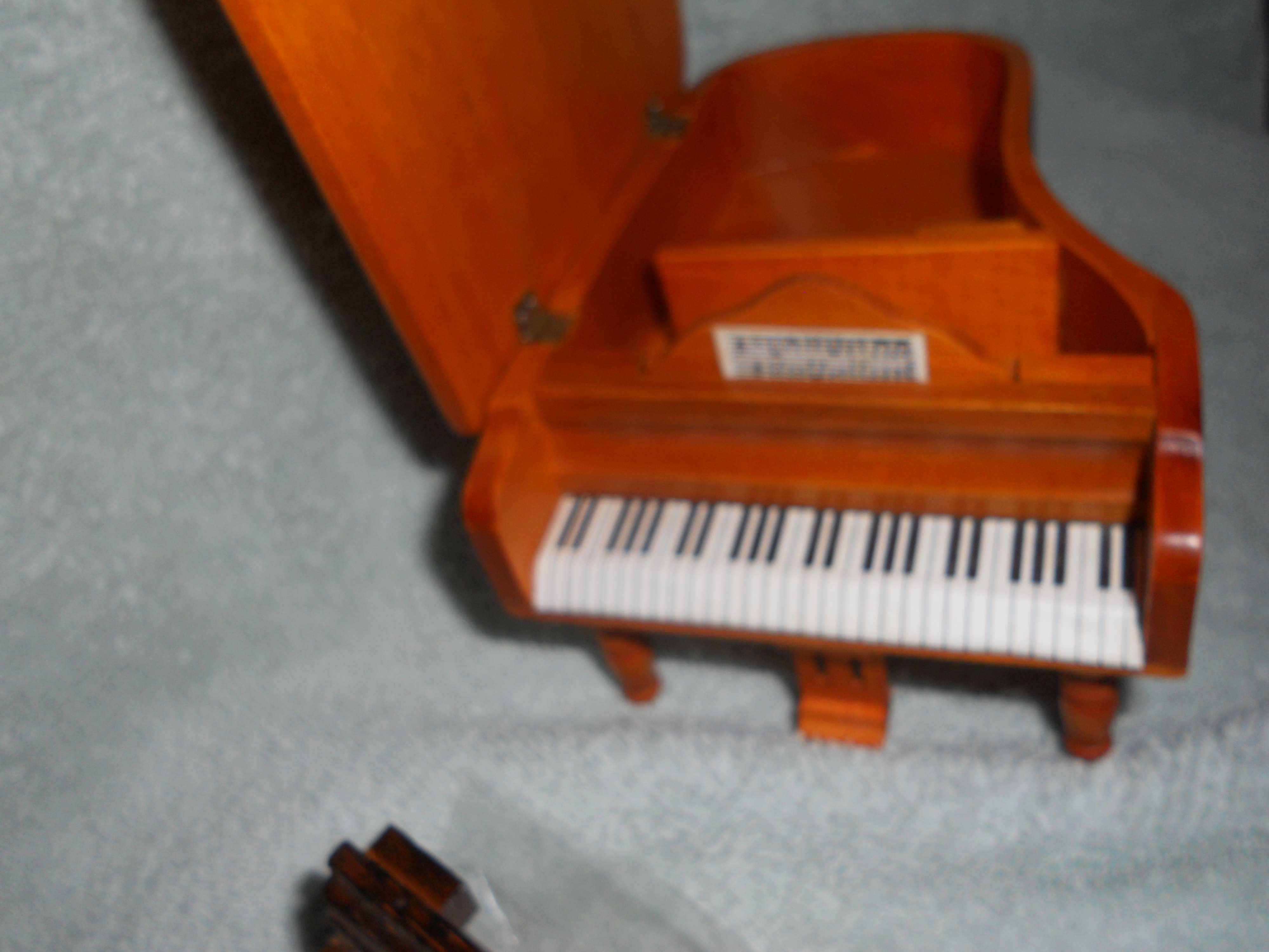Doll House wood grand piano