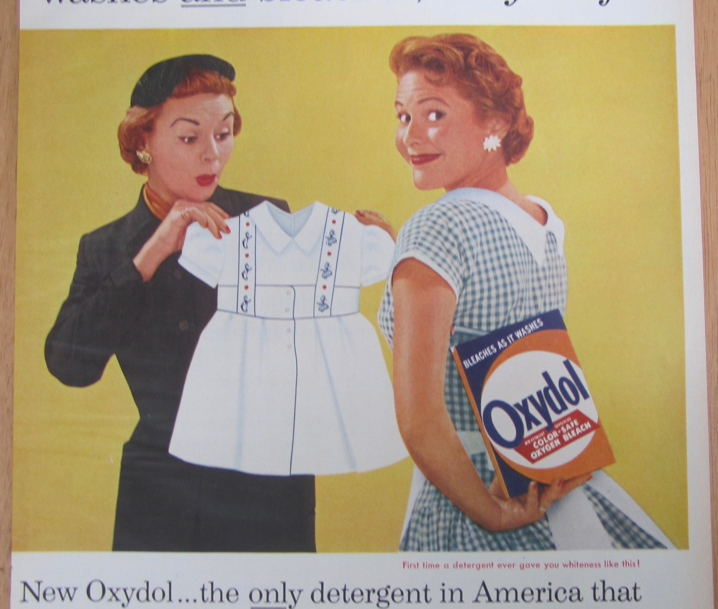 1957 Oxydol Detergent with Woman Holding Dress