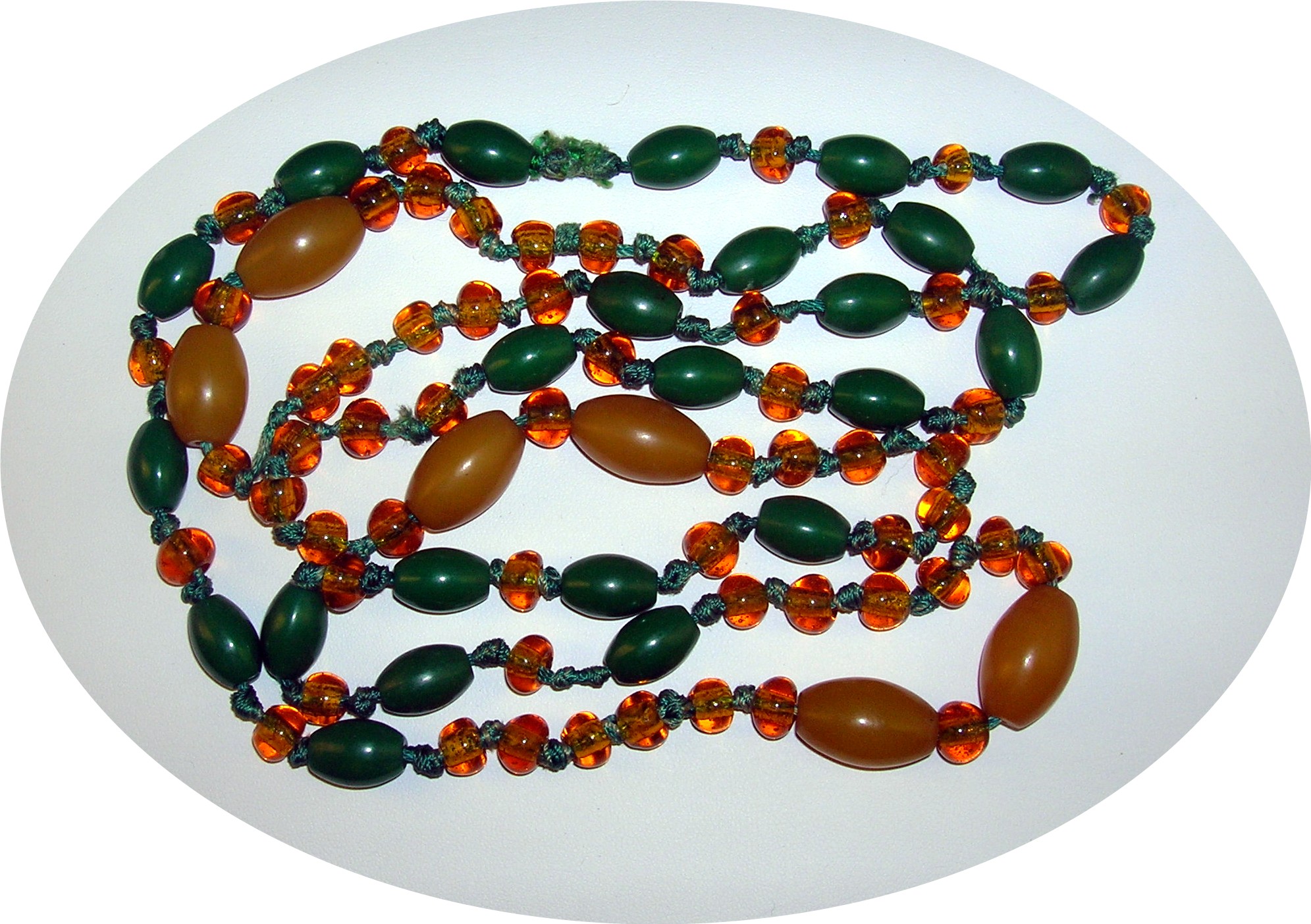 Old Amber Glass and lucite/Bakelite Beads.