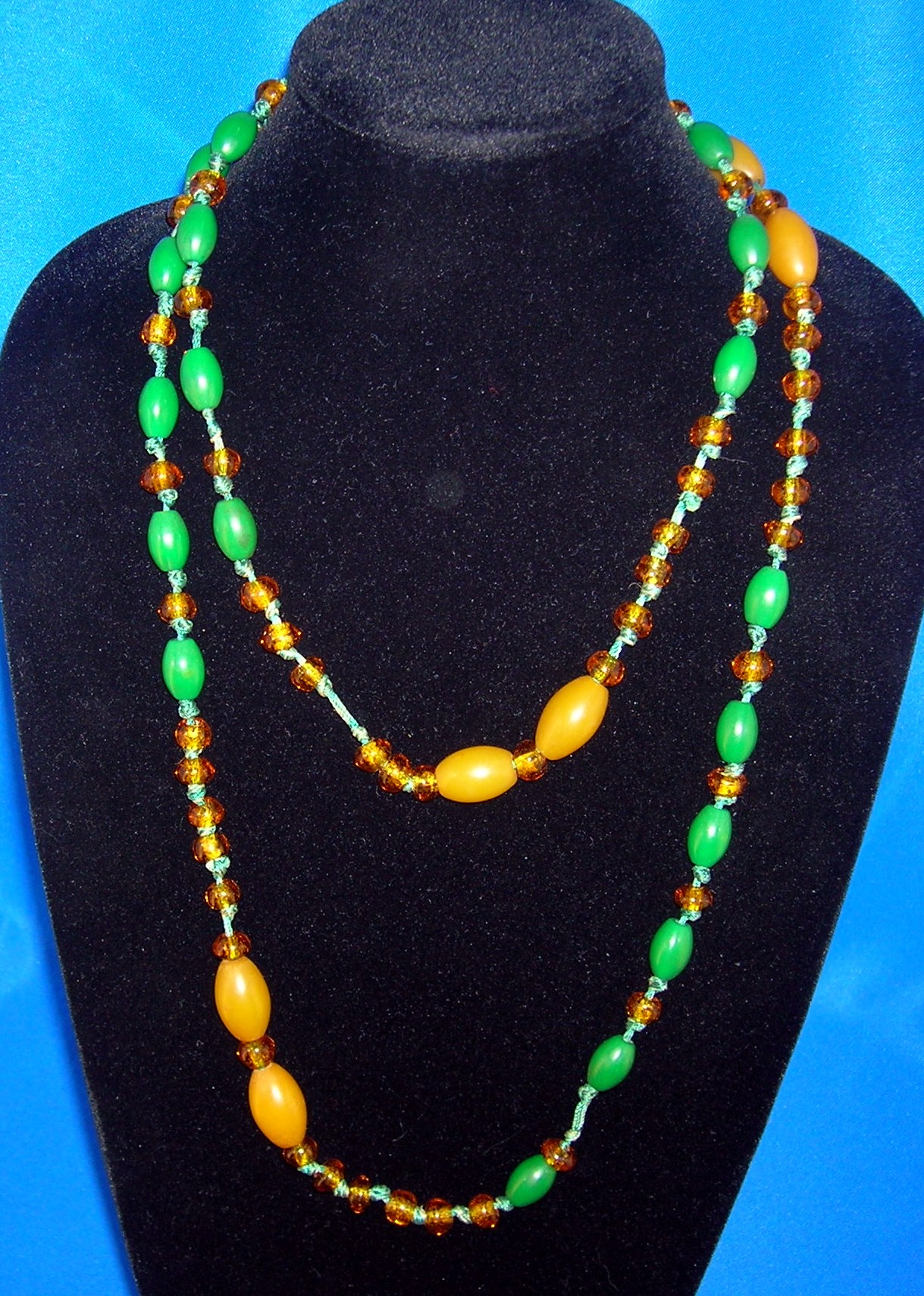 Old Amber Glass and lucite/Bakelite Beads.