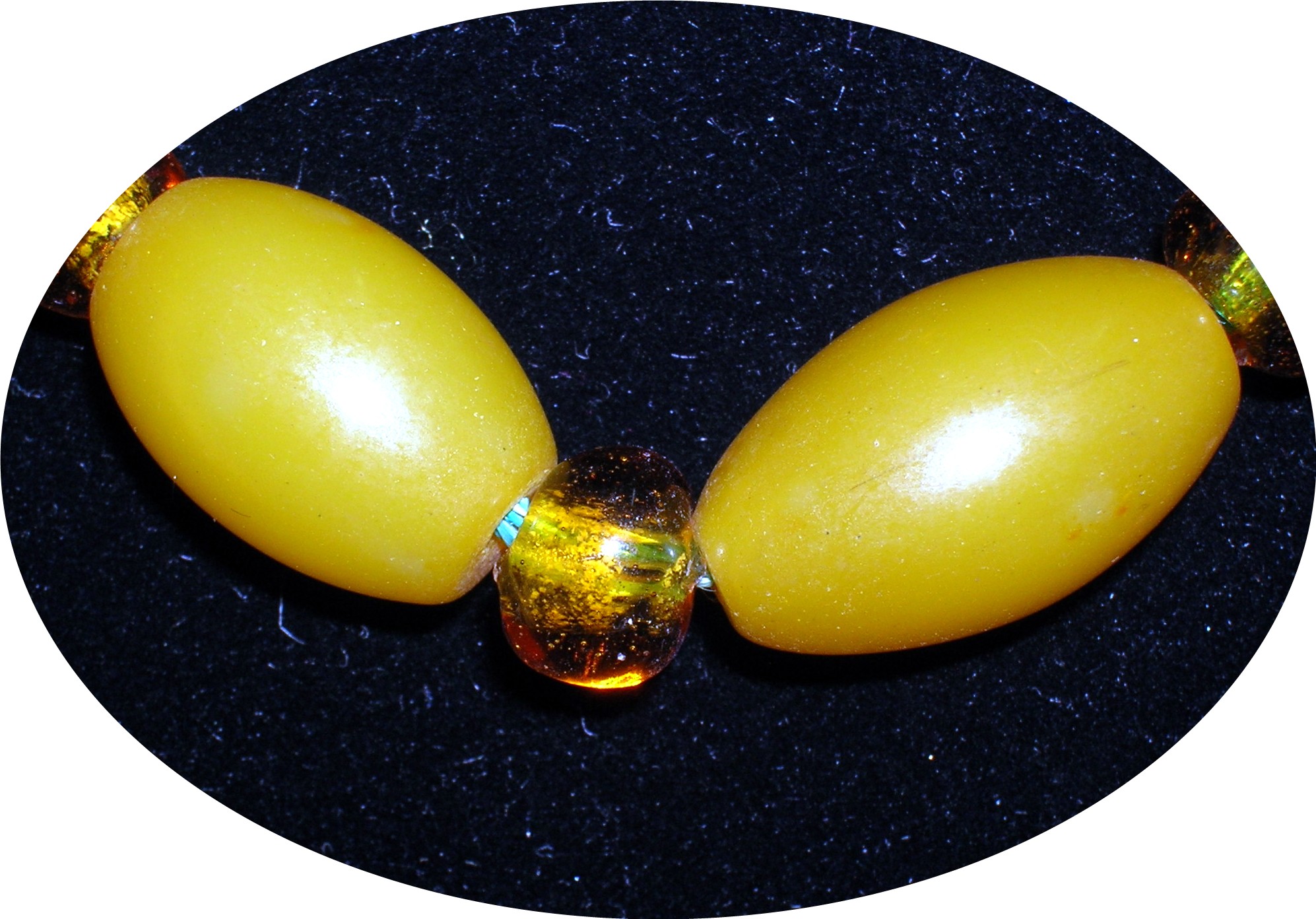 Old Amber Glass and lucite/Bakelite Beads.