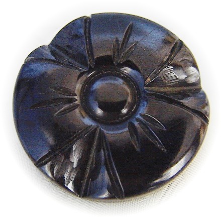 Bakelite Black Deeply Carved Button