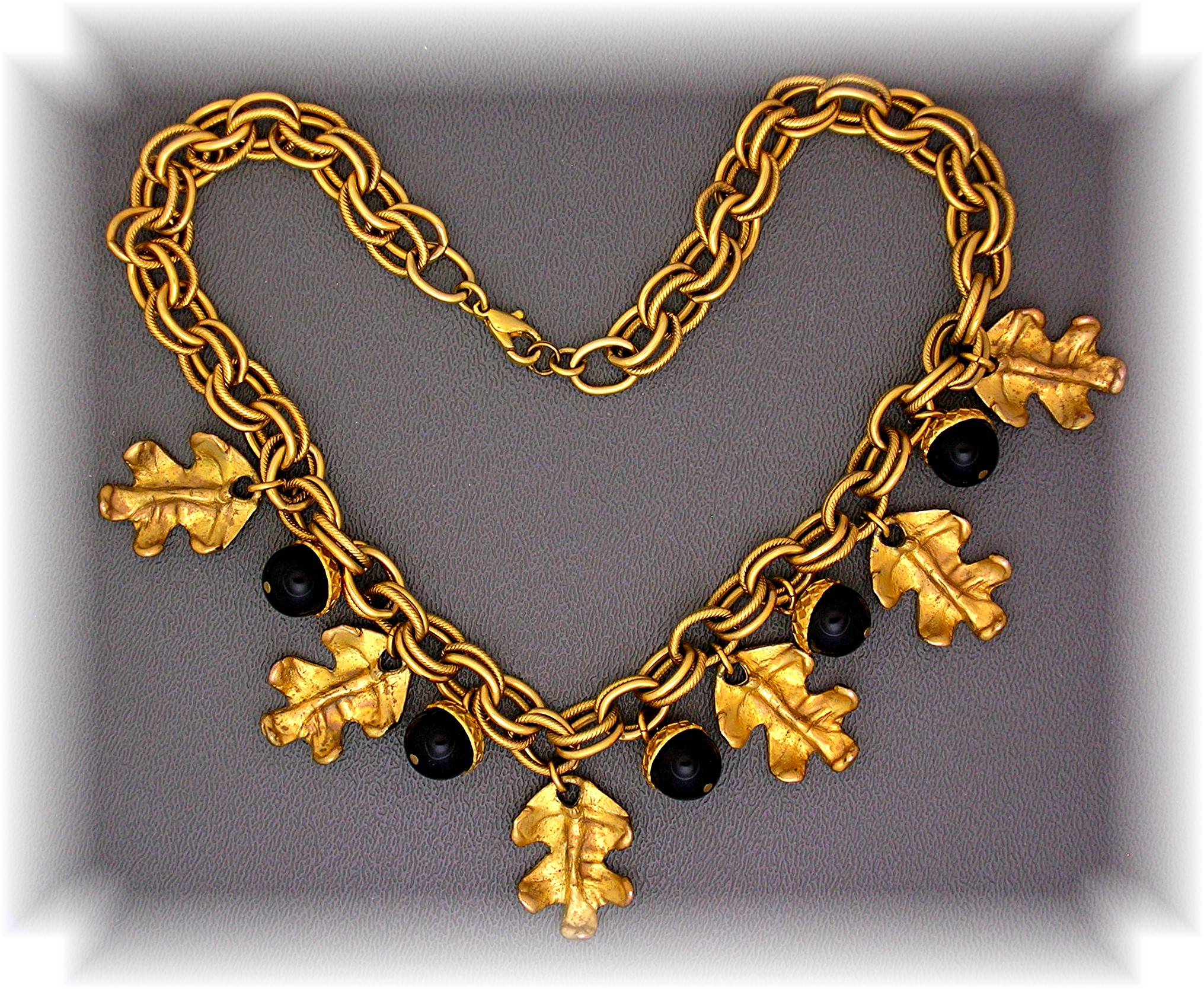 DAUPLAISE Gold Necklace with Leaves and Lucite Acorns