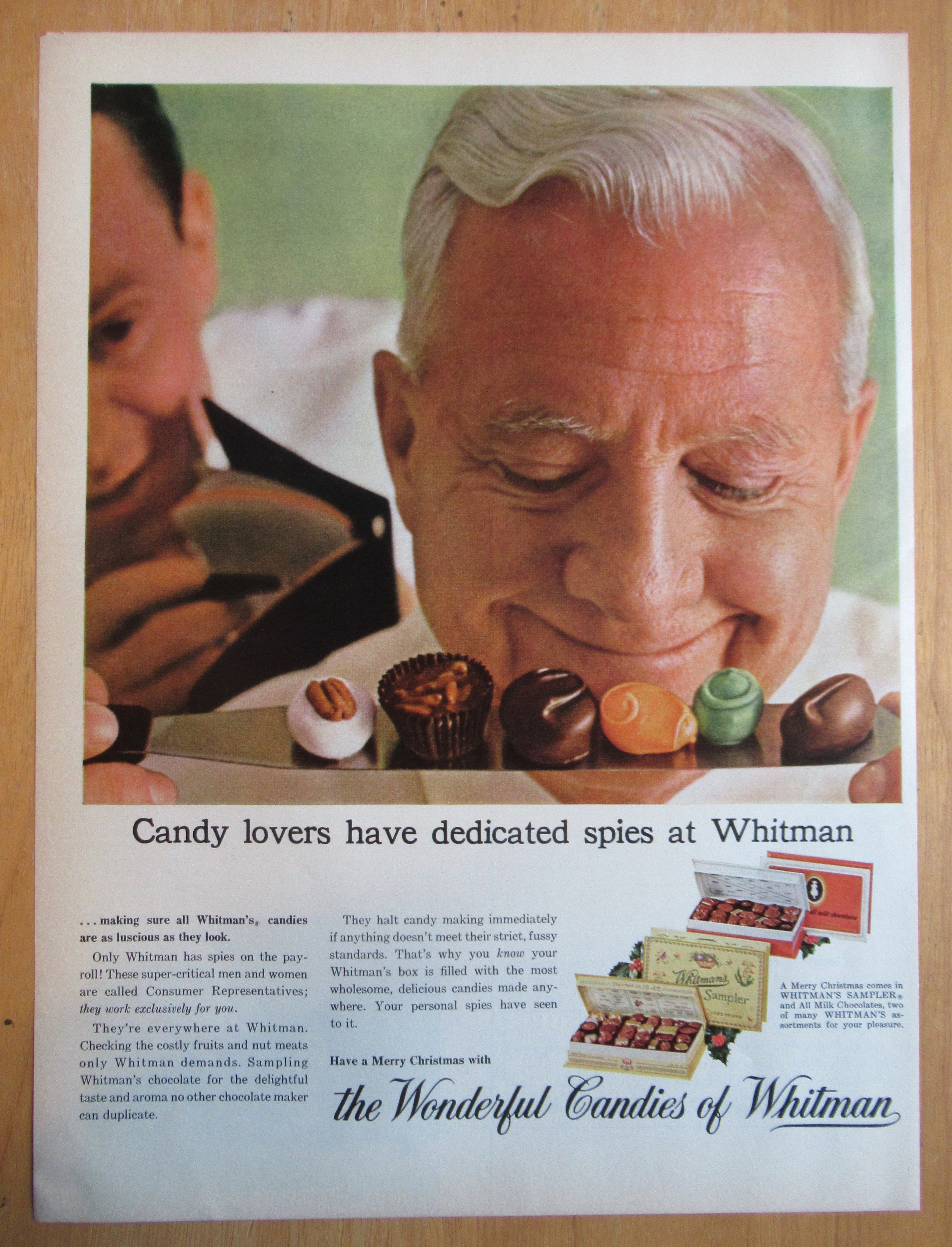 1964 Whitman's Candies with Man Smiling At Candy Pieces
