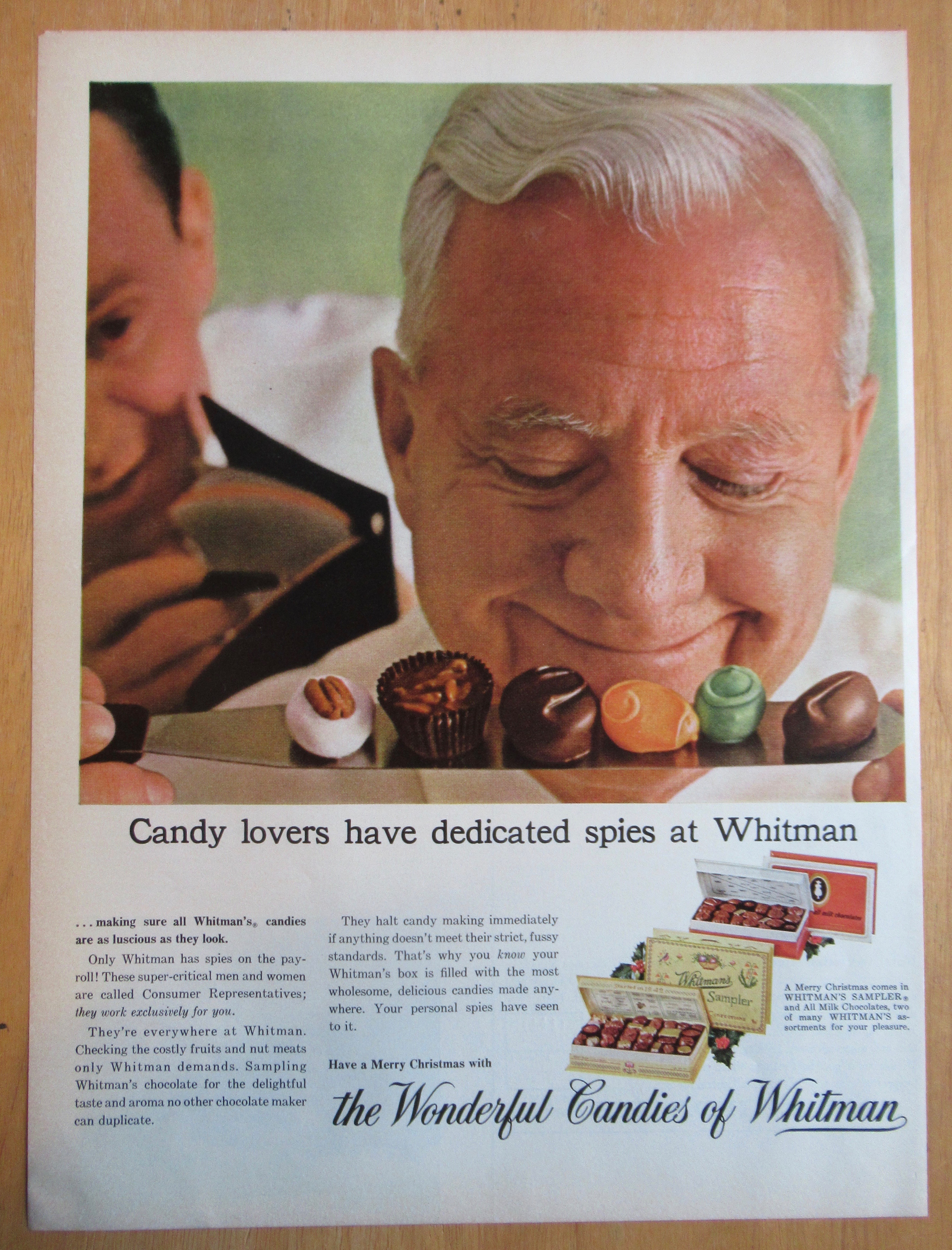 1964 Whitman's Candies with Man Smiling At Candy Pieces