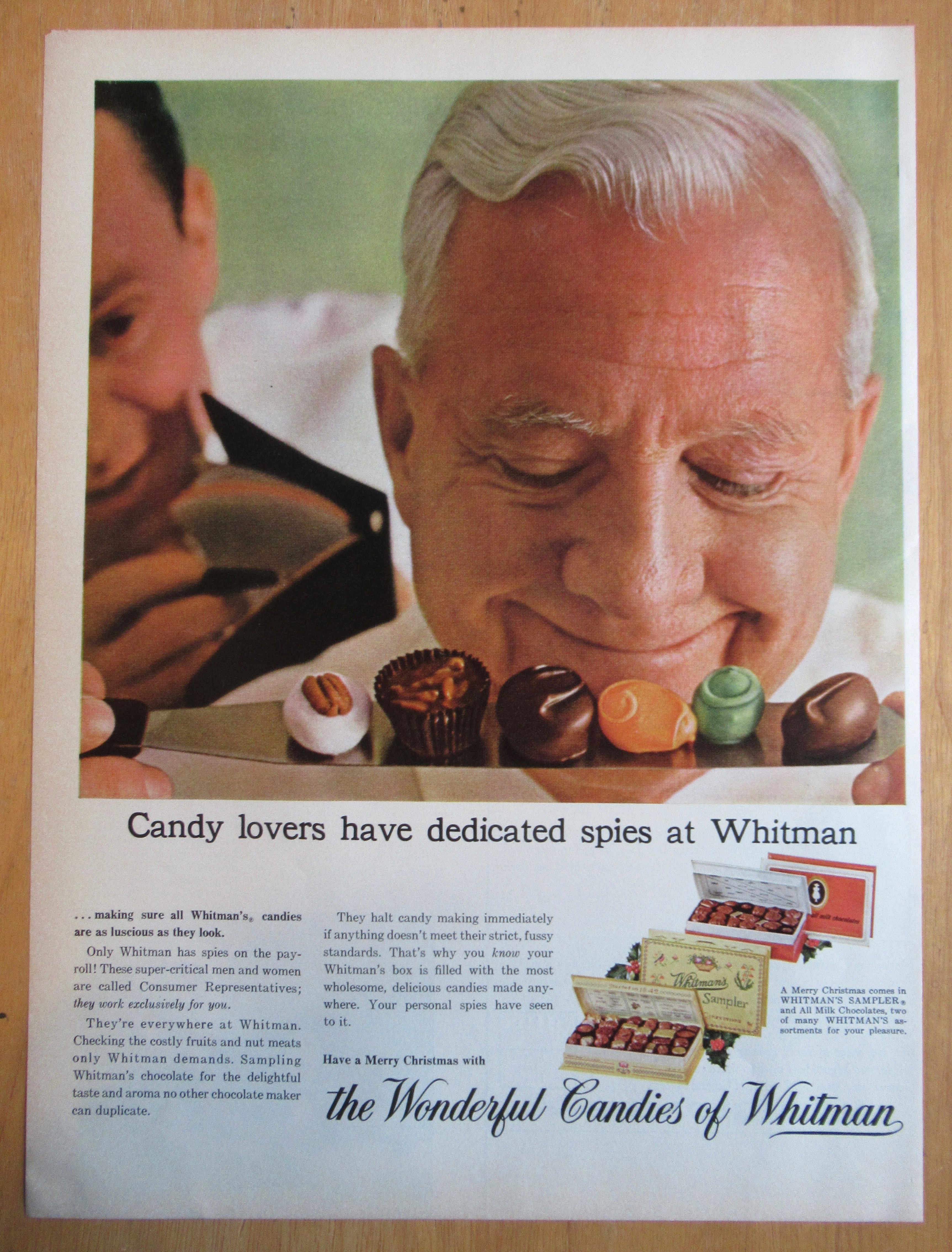 1964 Whitman's Candies with Man Smiling At Candy Pieces