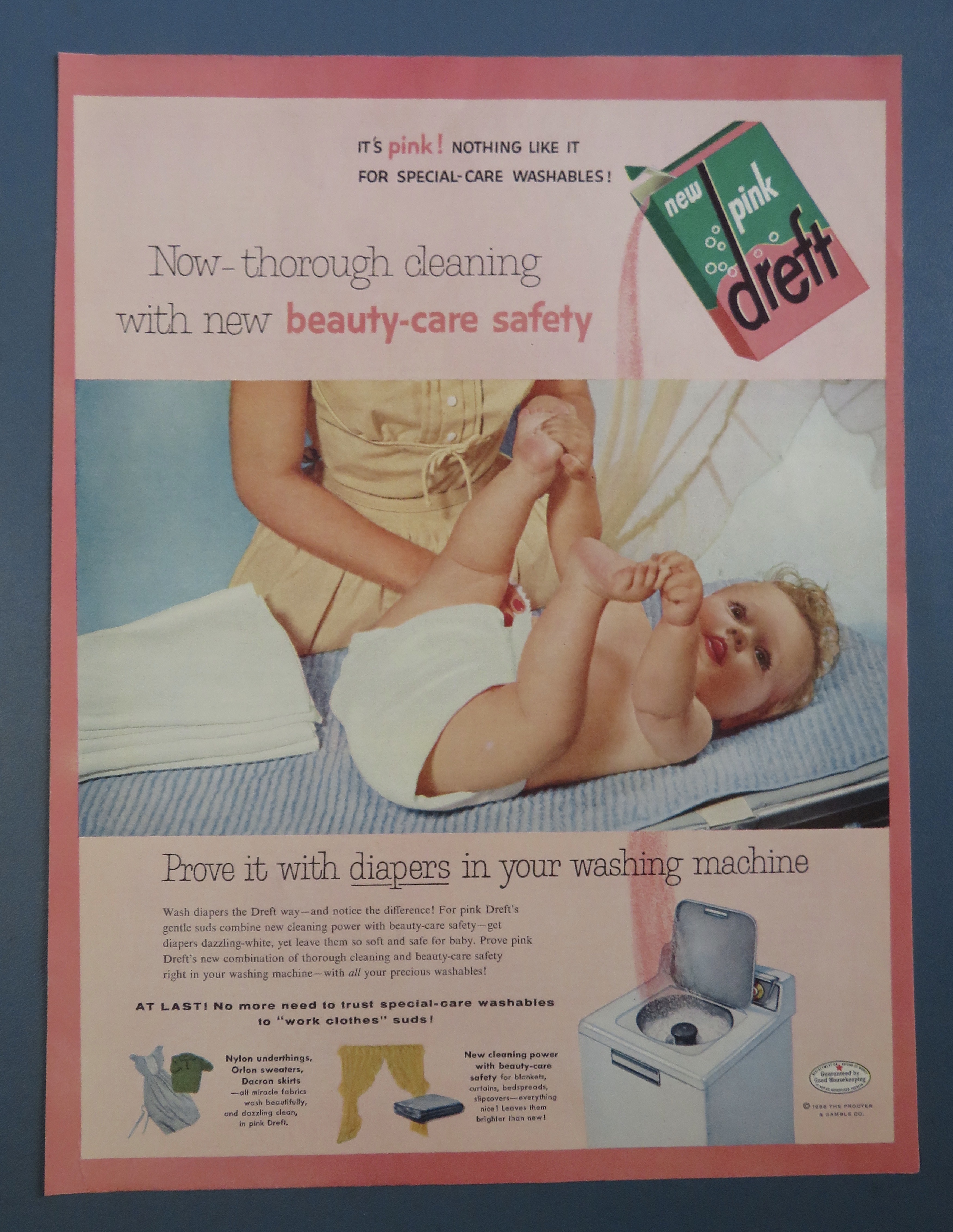 1956 Pink Dreft with Baby Laying On Table