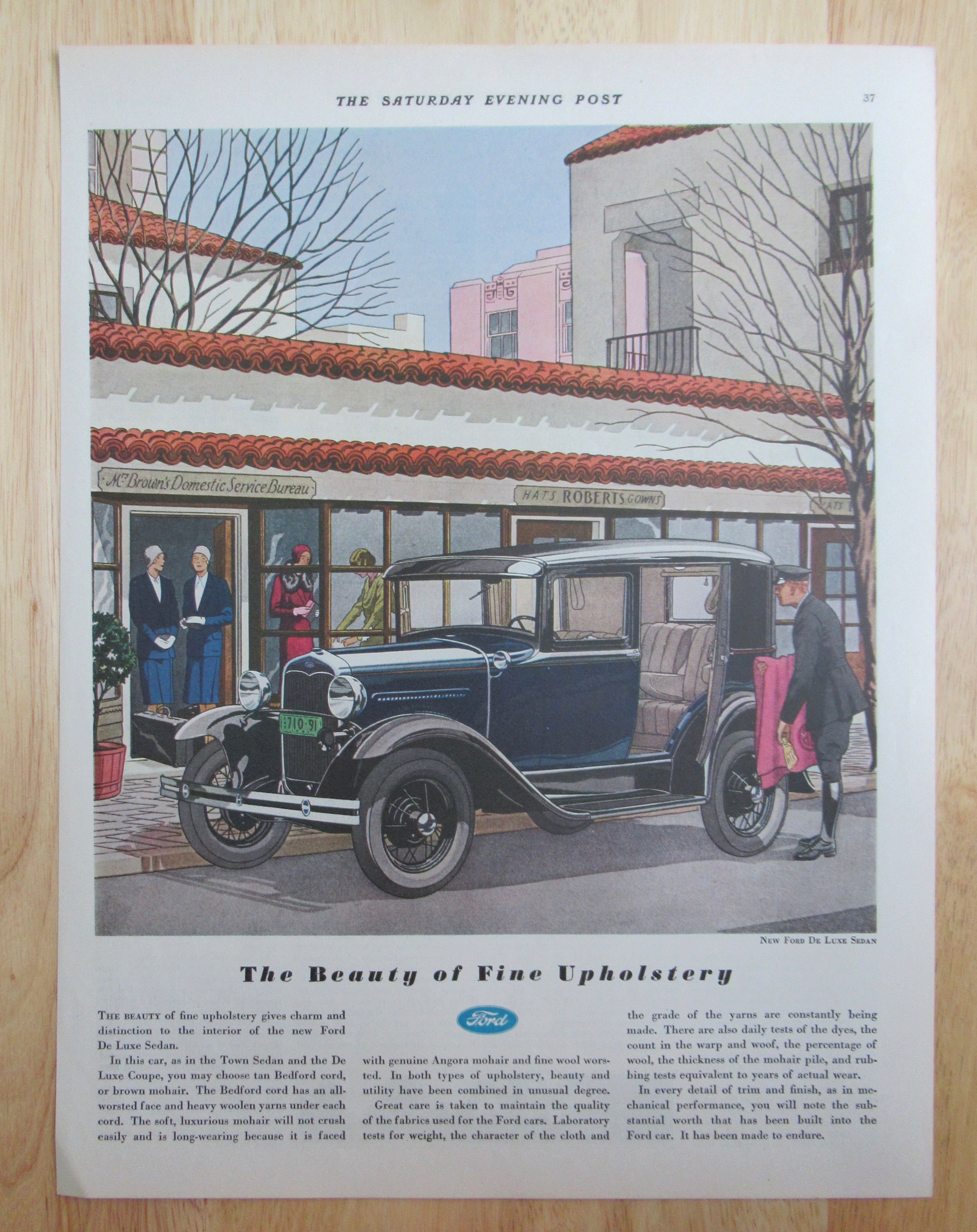 1931 Ford with The New Ford De Luxe Sedan