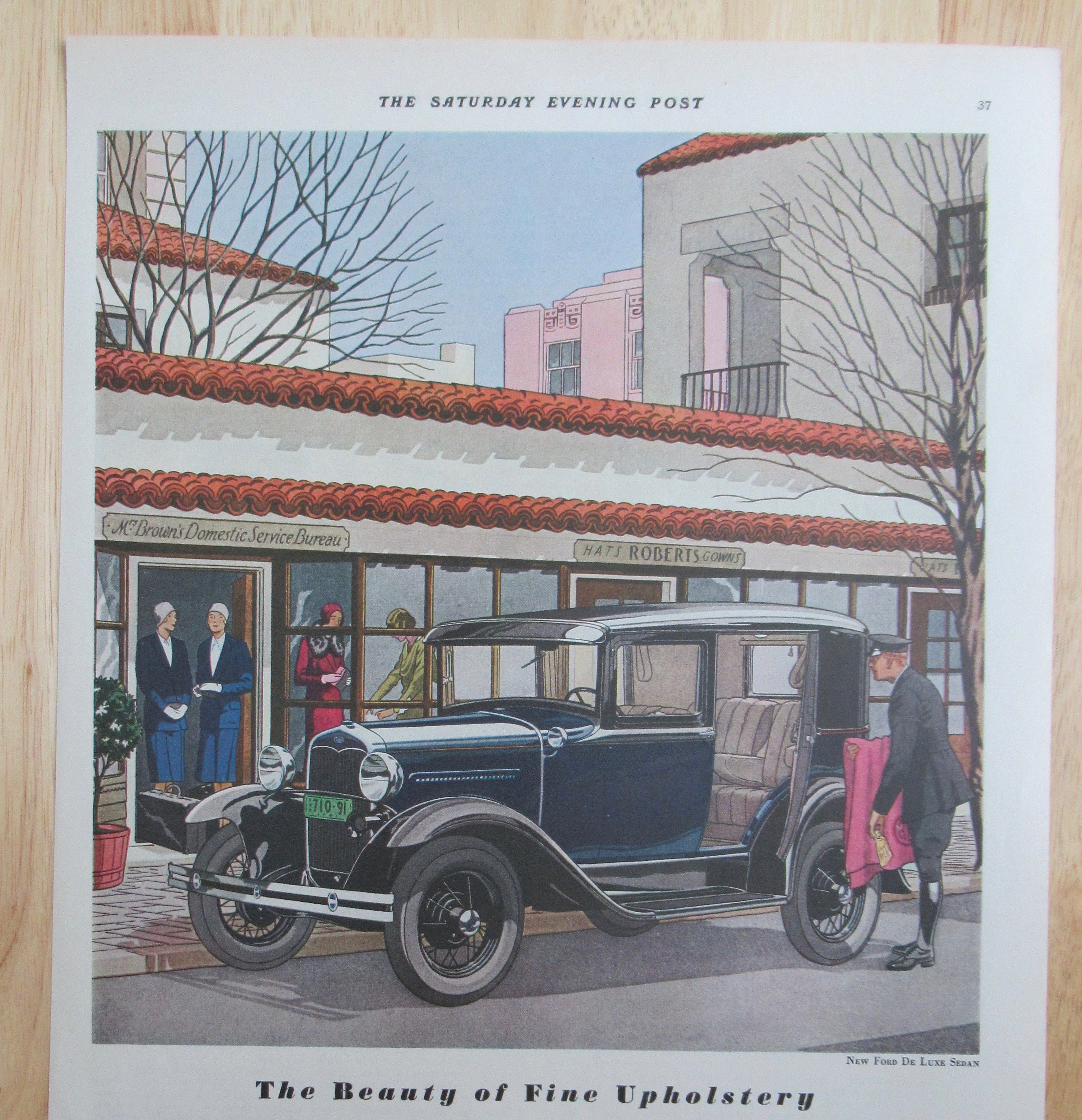 1931 Ford with The New Ford De Luxe Sedan
