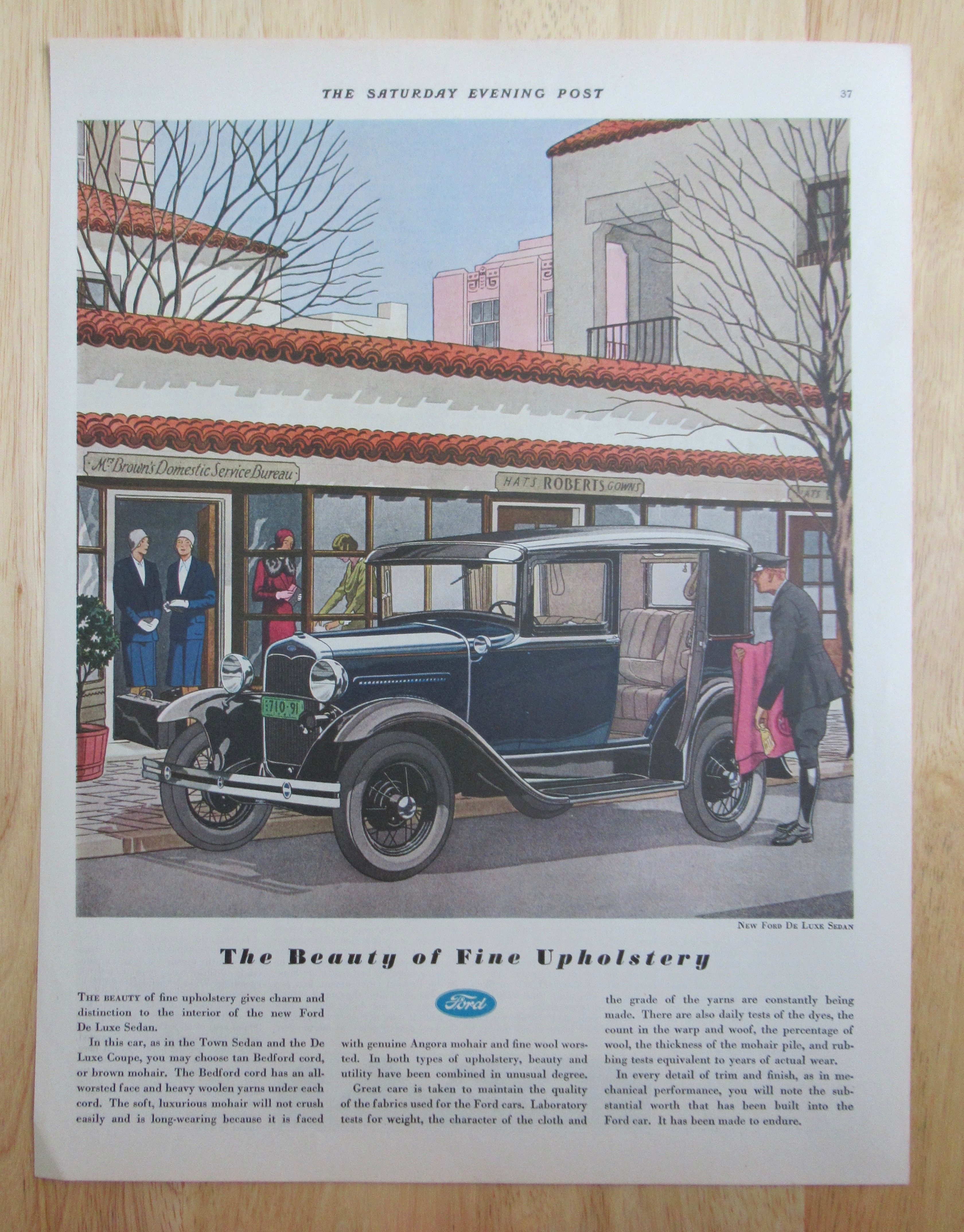 1931 Ford with The New Ford De Luxe Sedan