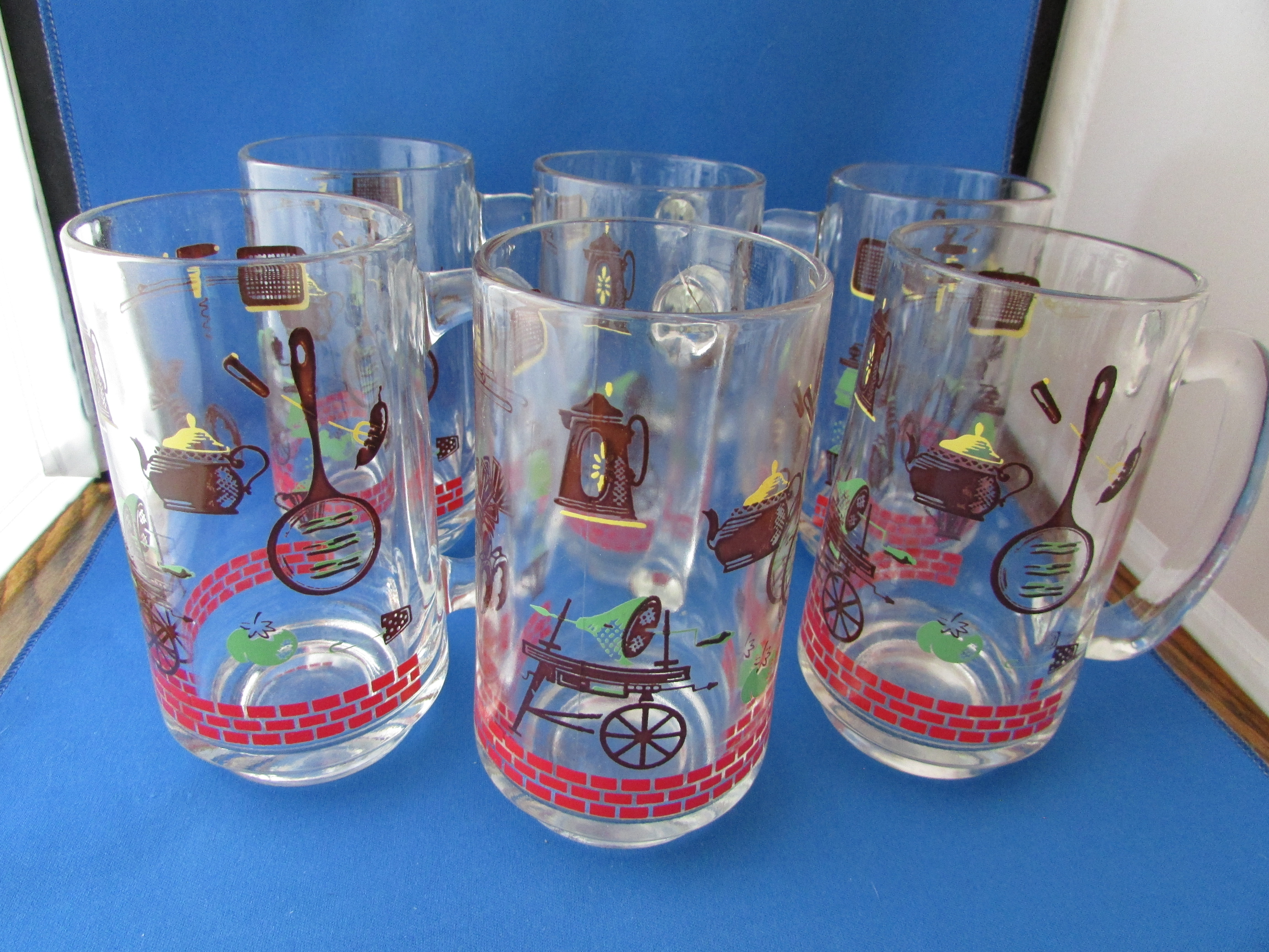 Early American Motif Glass Mugs