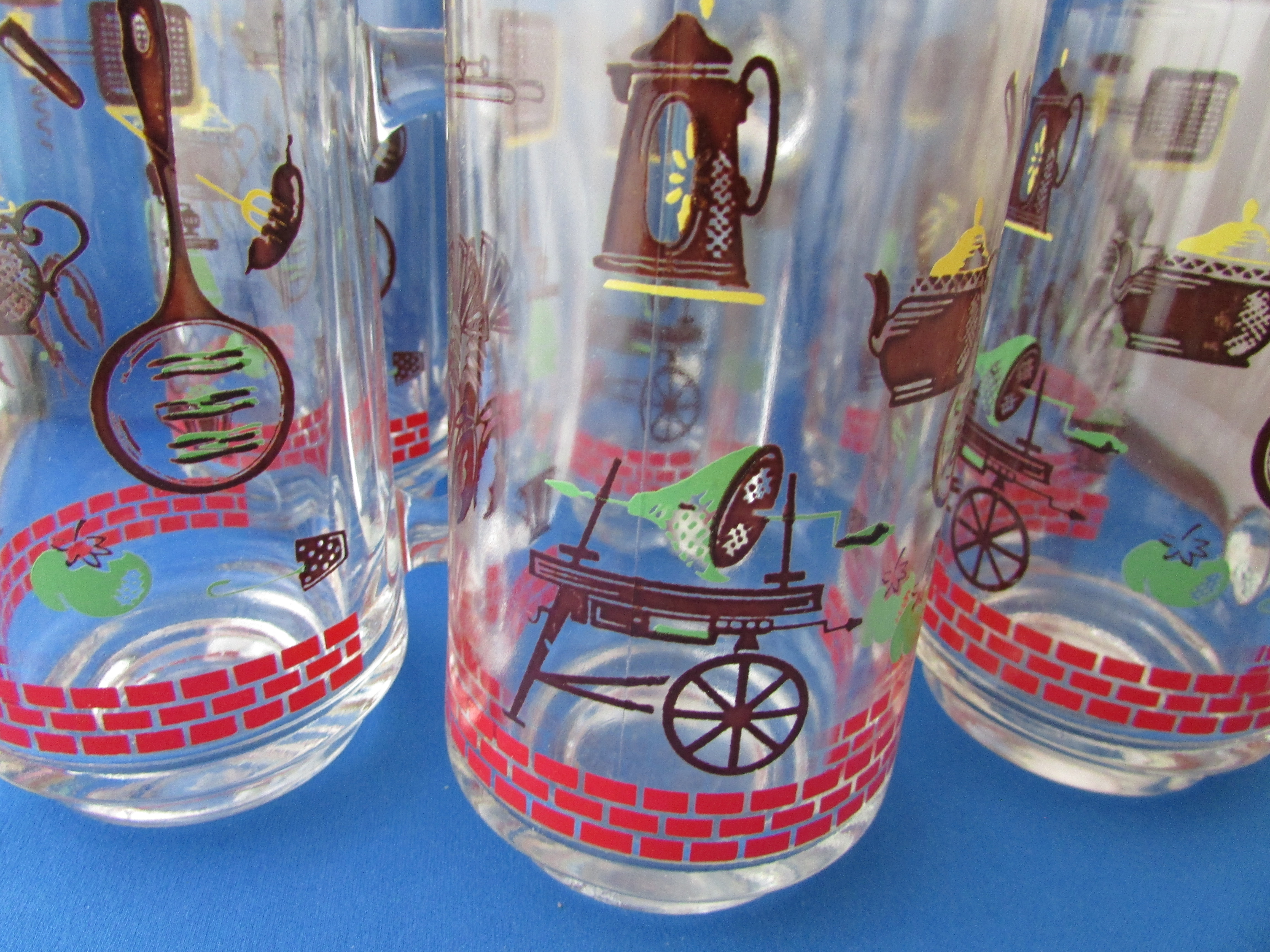 Early American Motif Glass Mugs