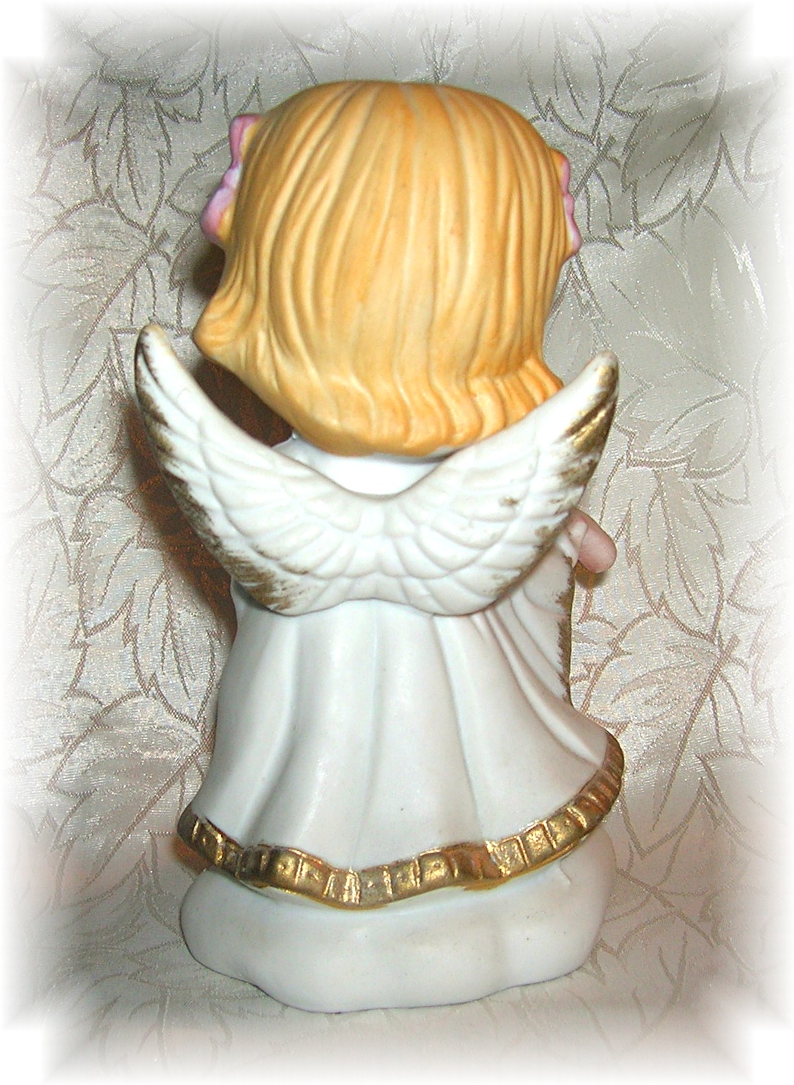 Porcelain Angel Figurine Playing A Violin....
