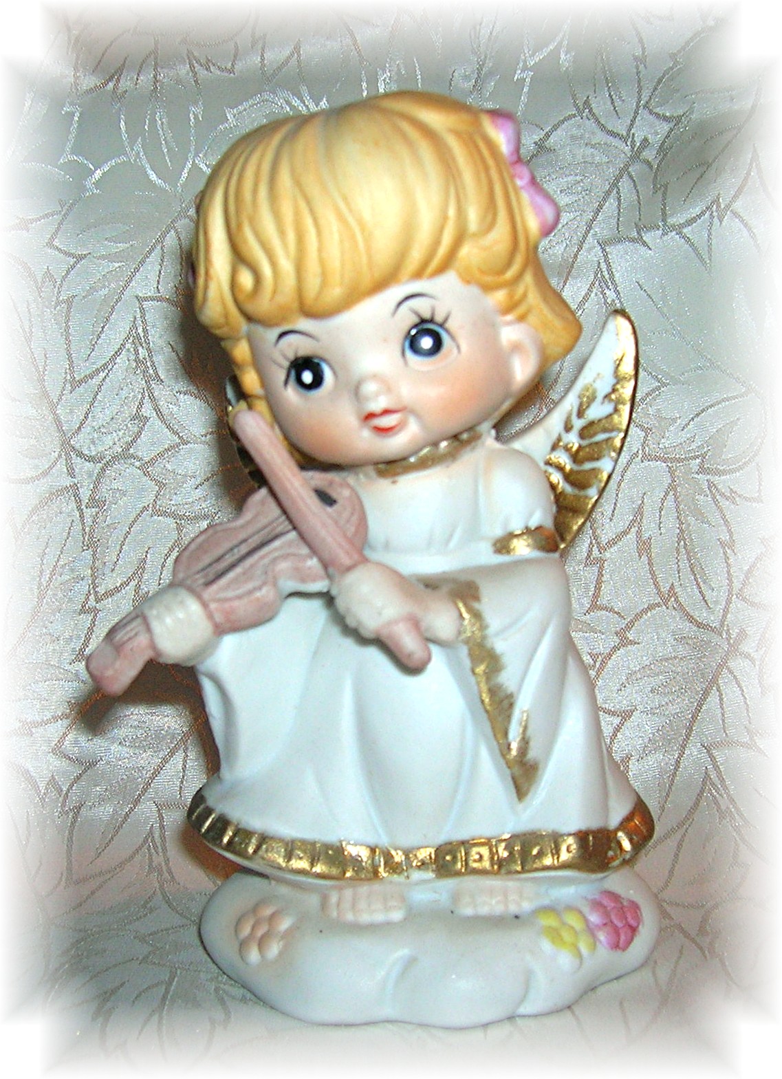 Porcelain Angel Figurine Playing A Violin....