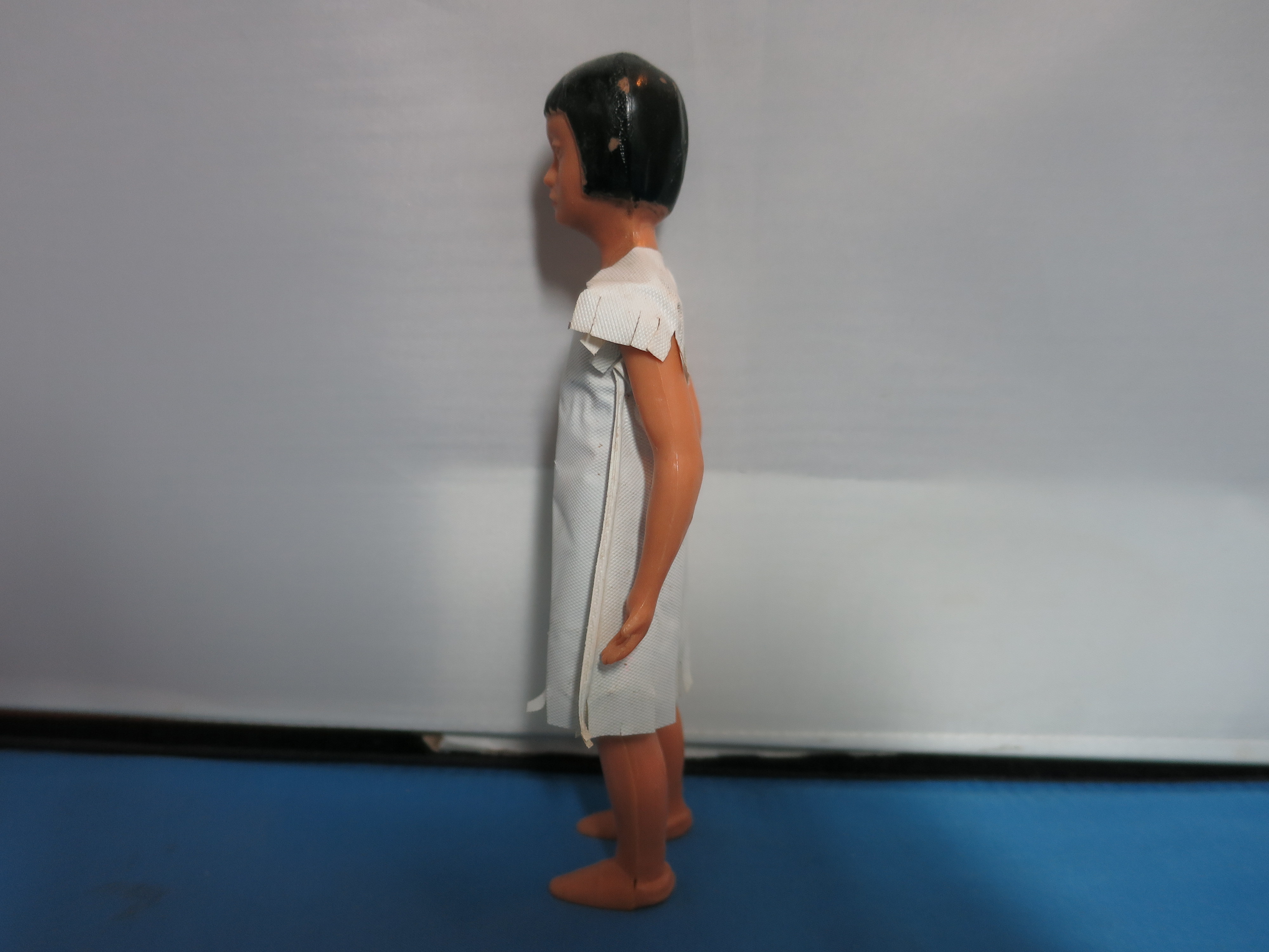 Vintage Indian Doll Hard Plastic 5 1/2 inch Oil Cloth Dress