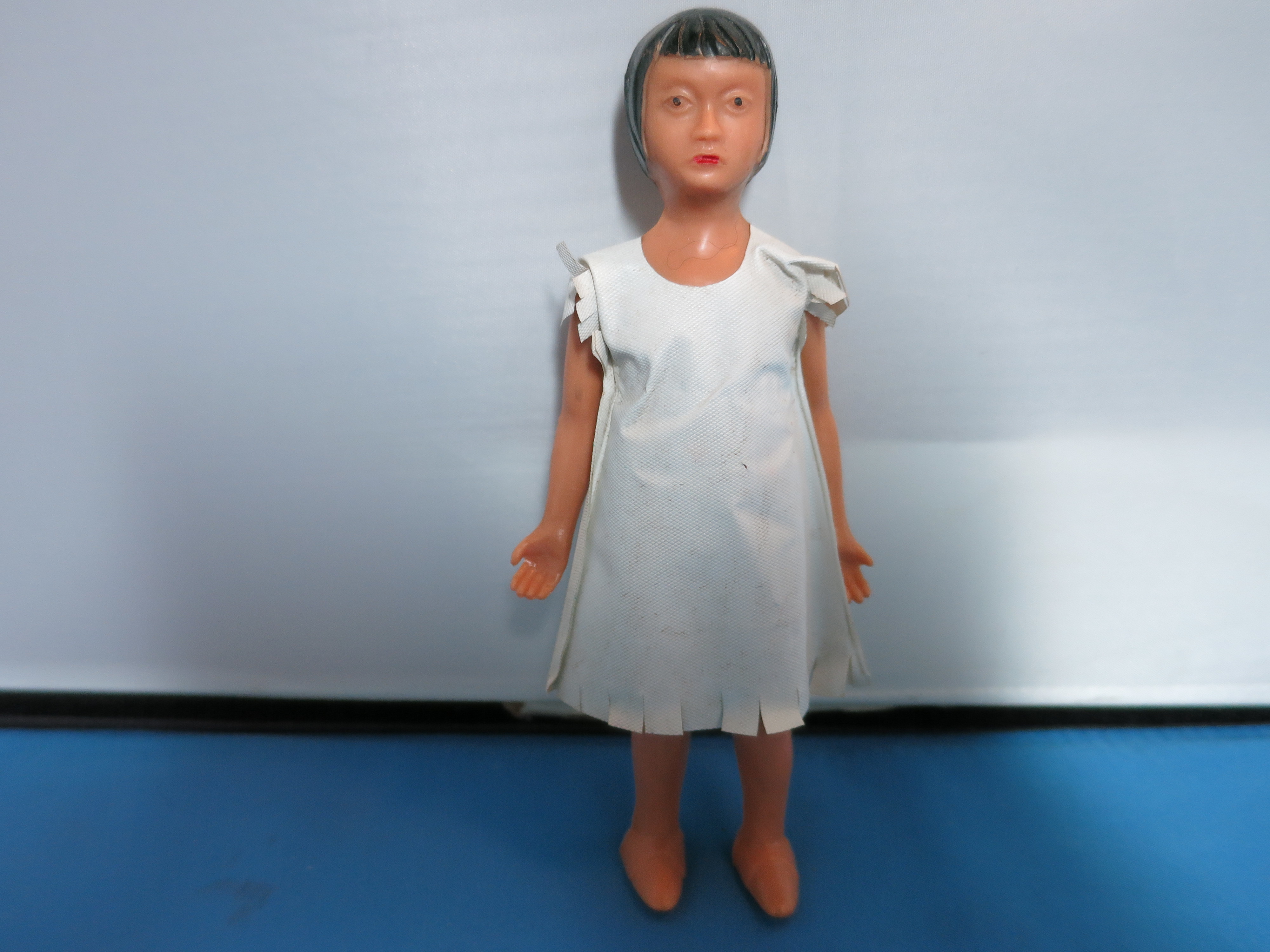 Vintage Indian Doll Hard Plastic 5 1/2 inch Oil Cloth Dress