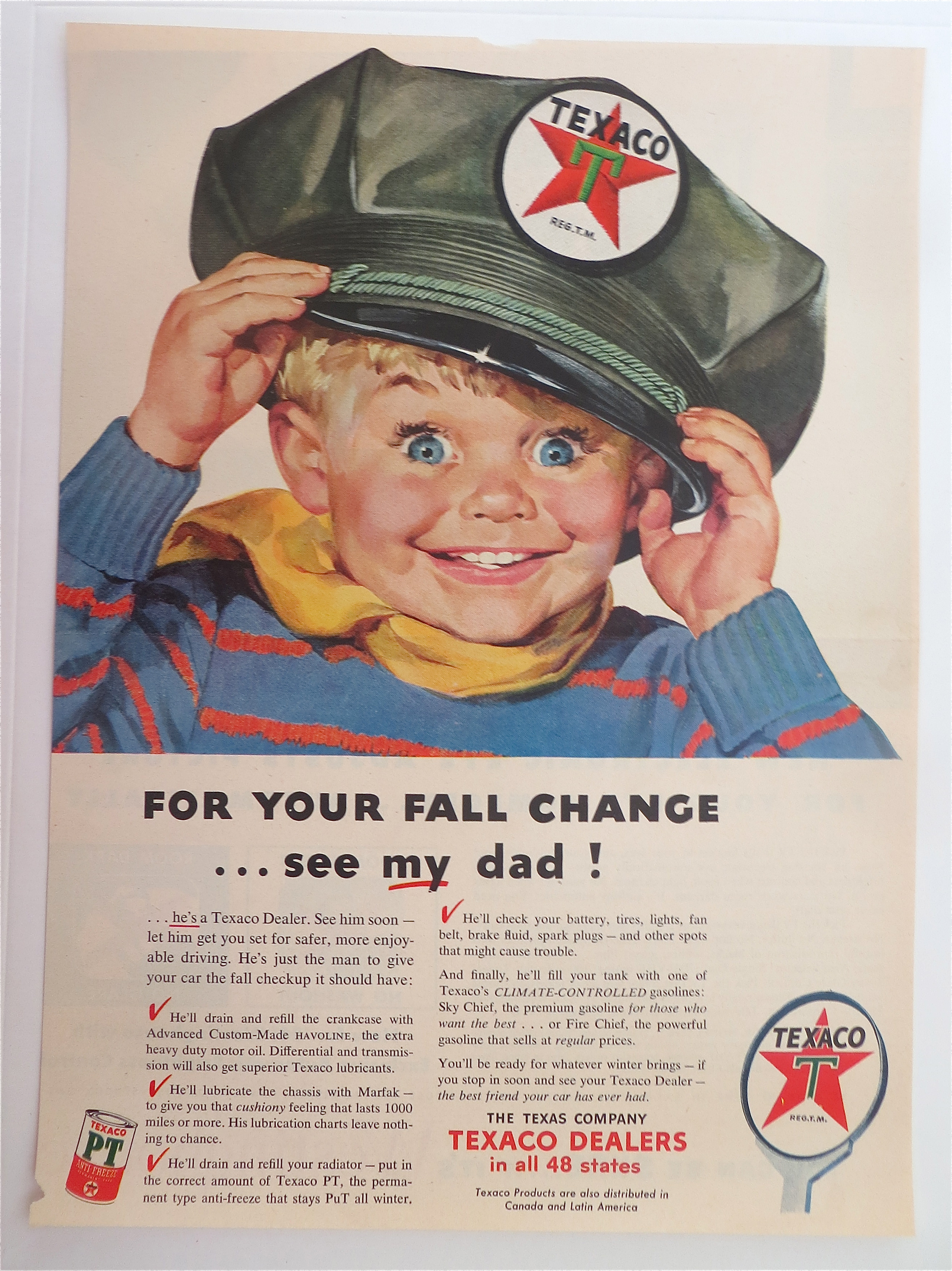 1950's Texaco Dealers with Boy Wearing Texaco Hat