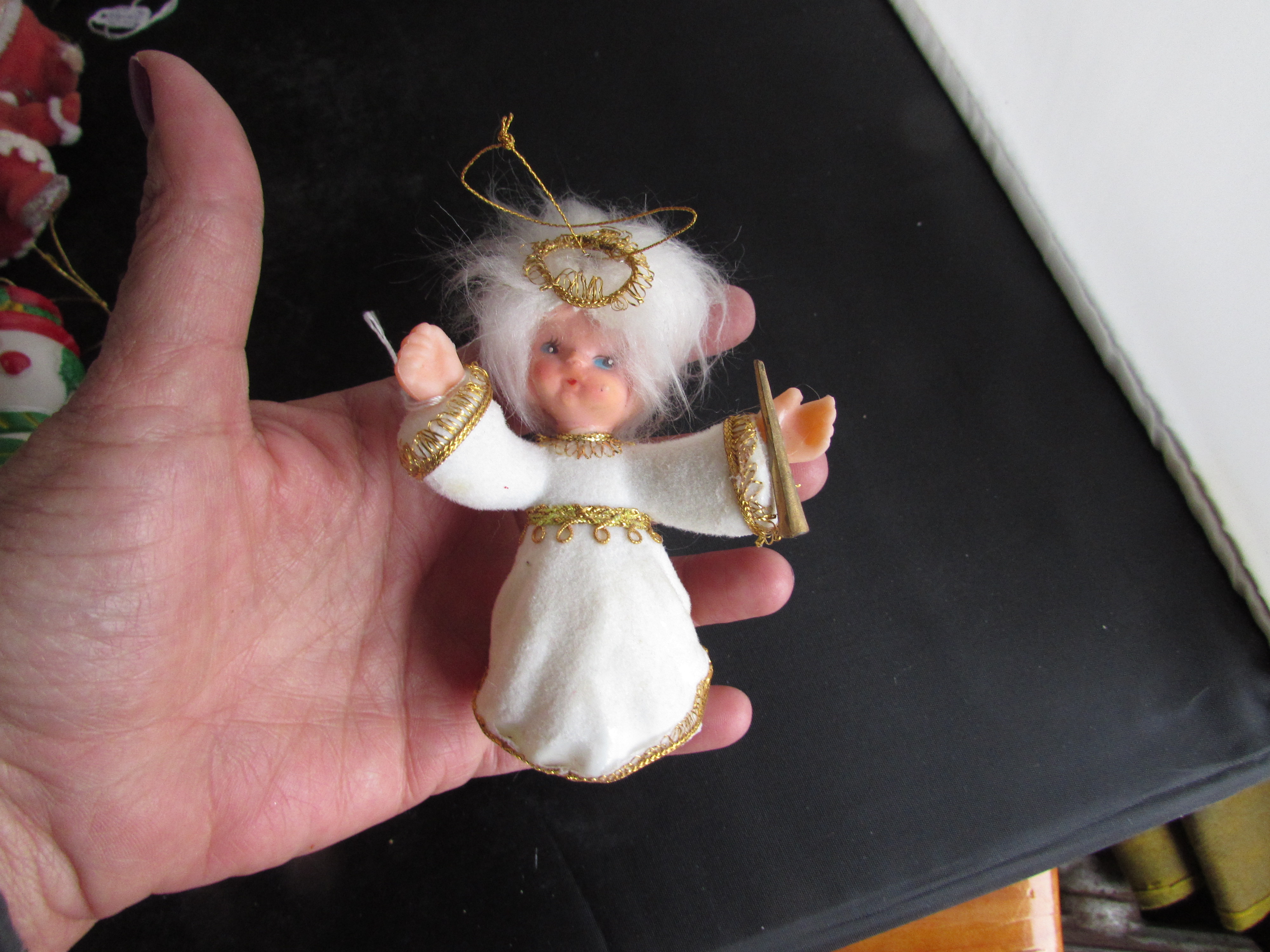 Plastic felted Angel with horn 3 1/2 inch