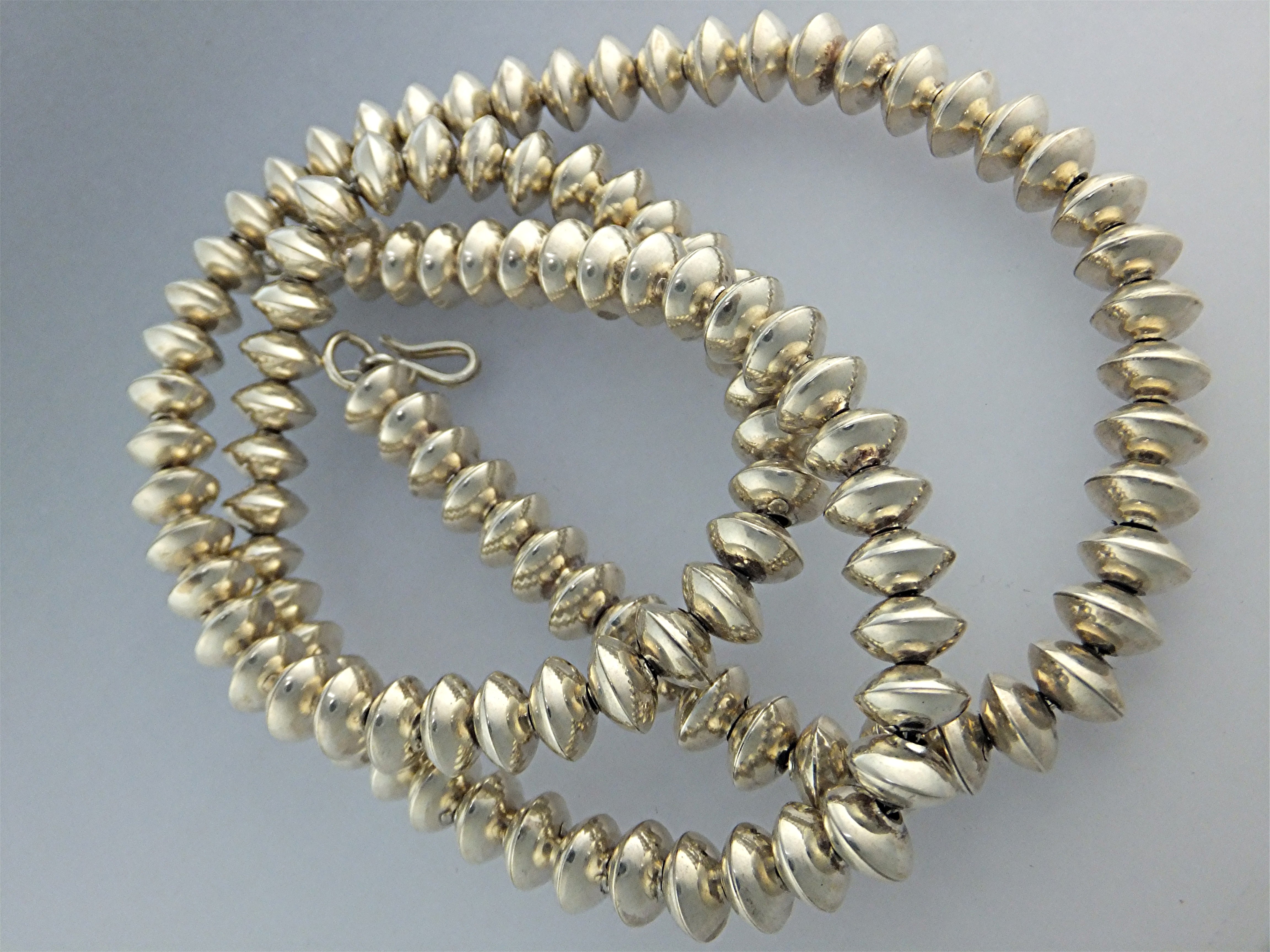 Native American  Sterling Silver Handmade Saucer Beads