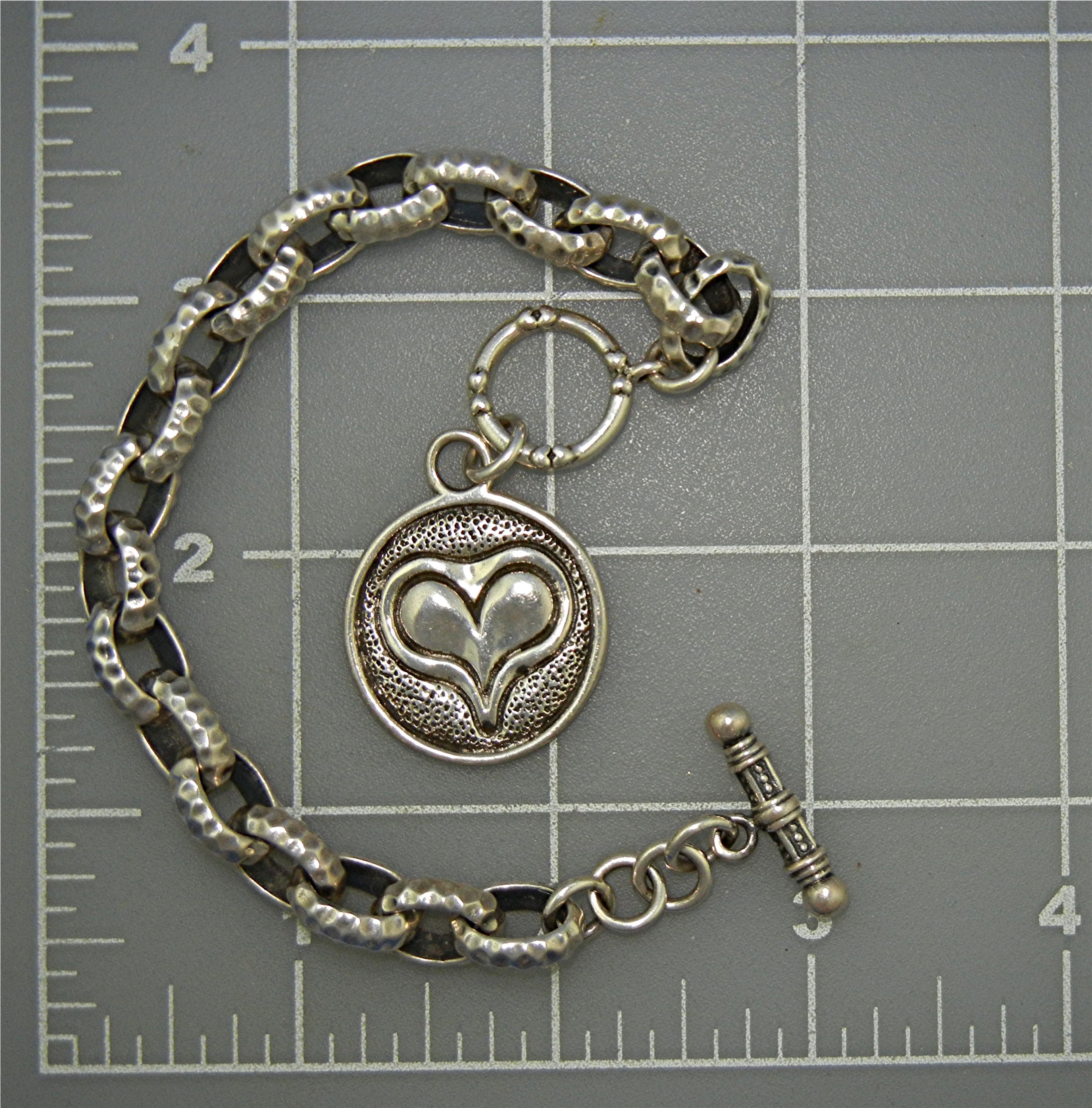 EXEX Sterling Silver Heart Bracelet By Claudia Agudelo
