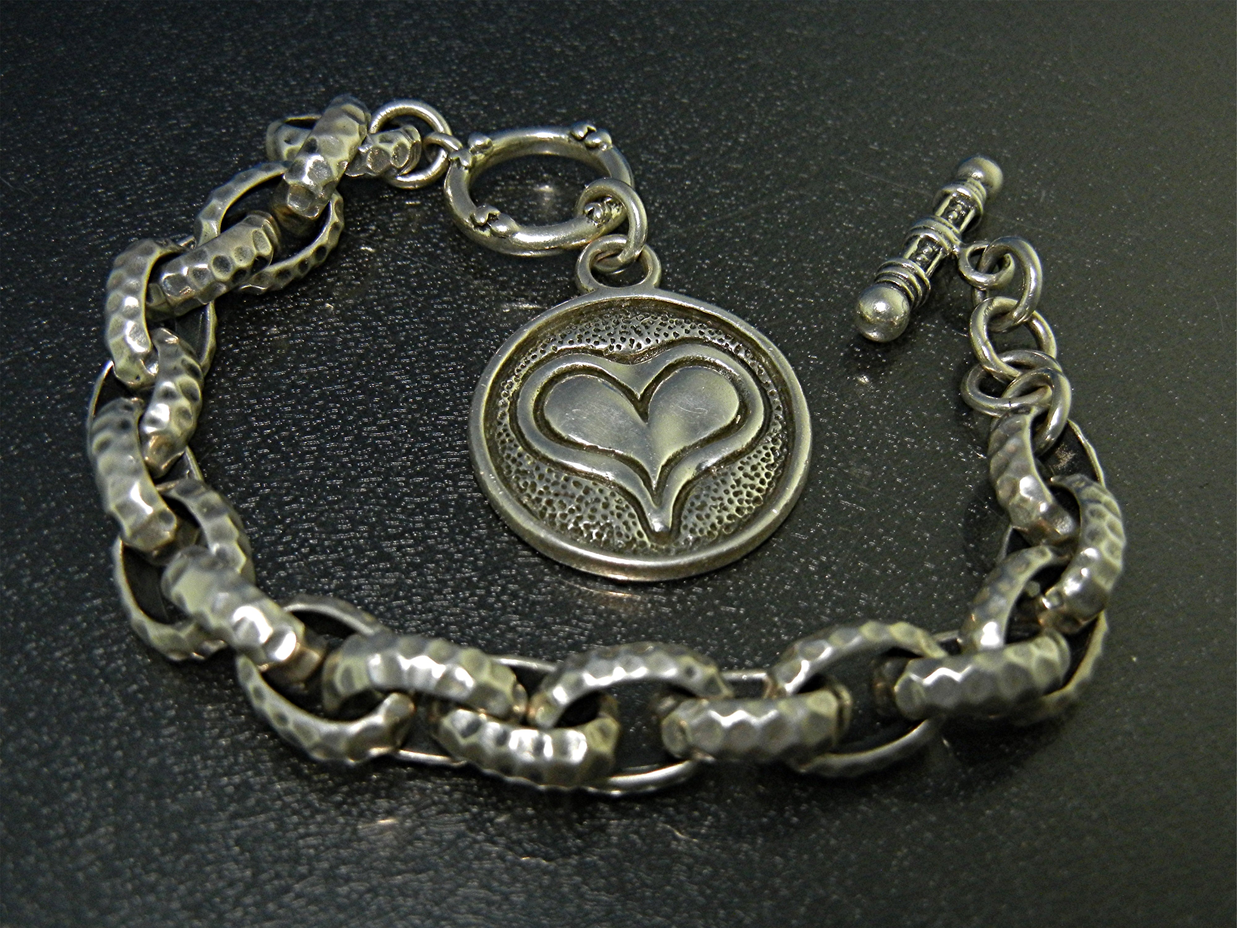 EXEX Sterling Silver Heart Bracelet By Claudia Agudelo