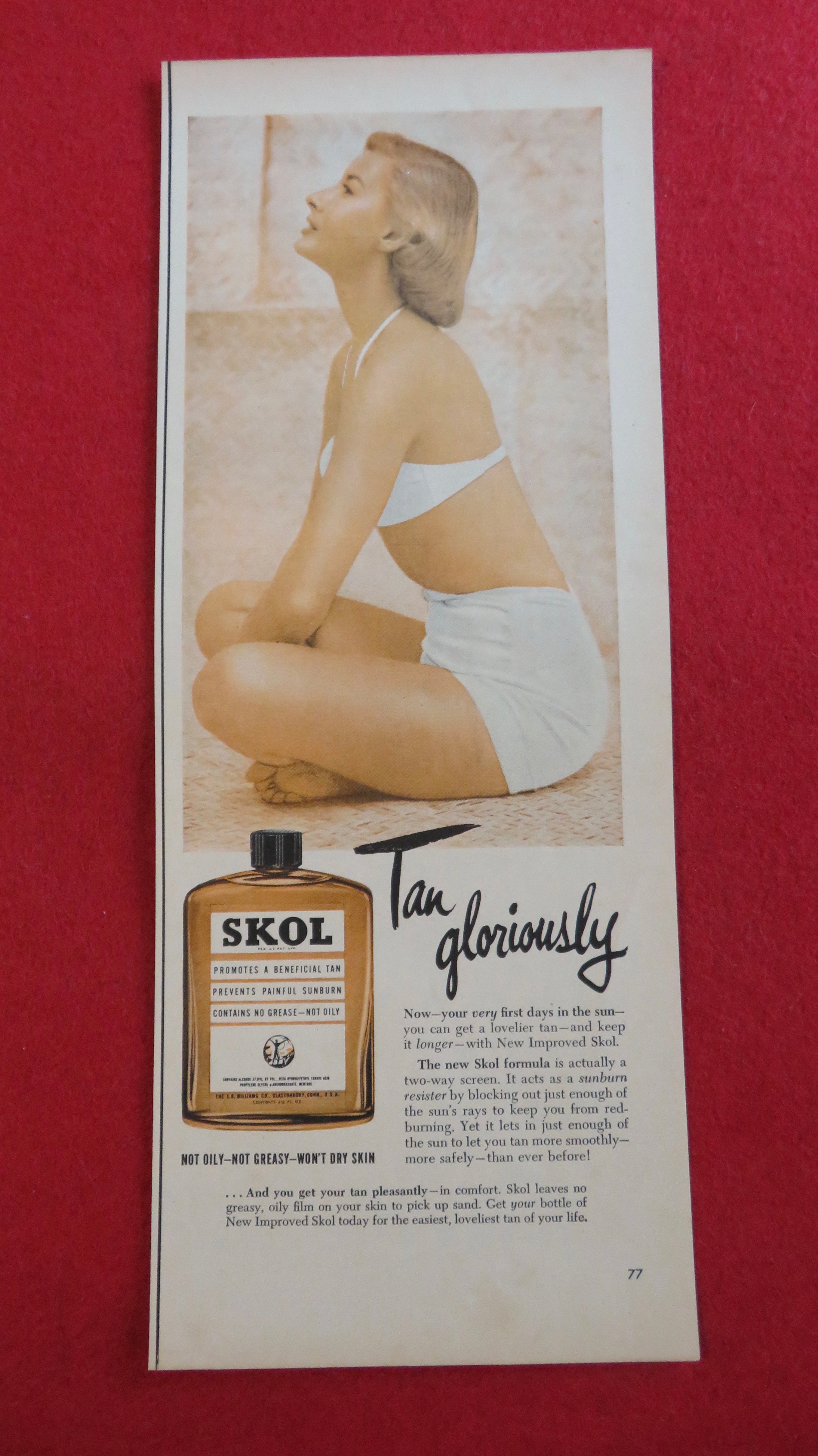 1951 Skol Tan Lotion with Woman Sitting In Swimsuit