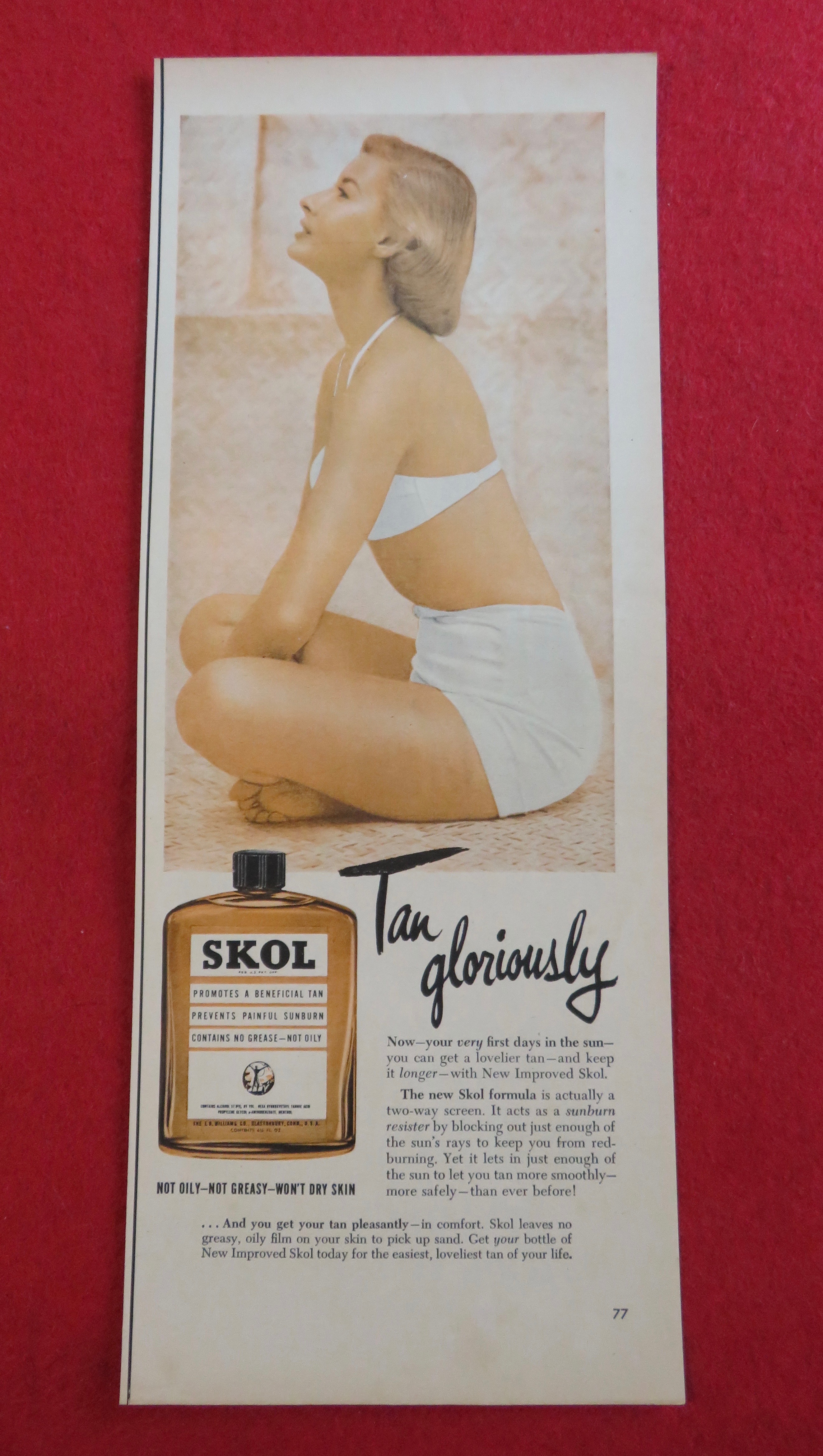1951 Skol Tan Lotion with Woman Sitting In Swimsuit