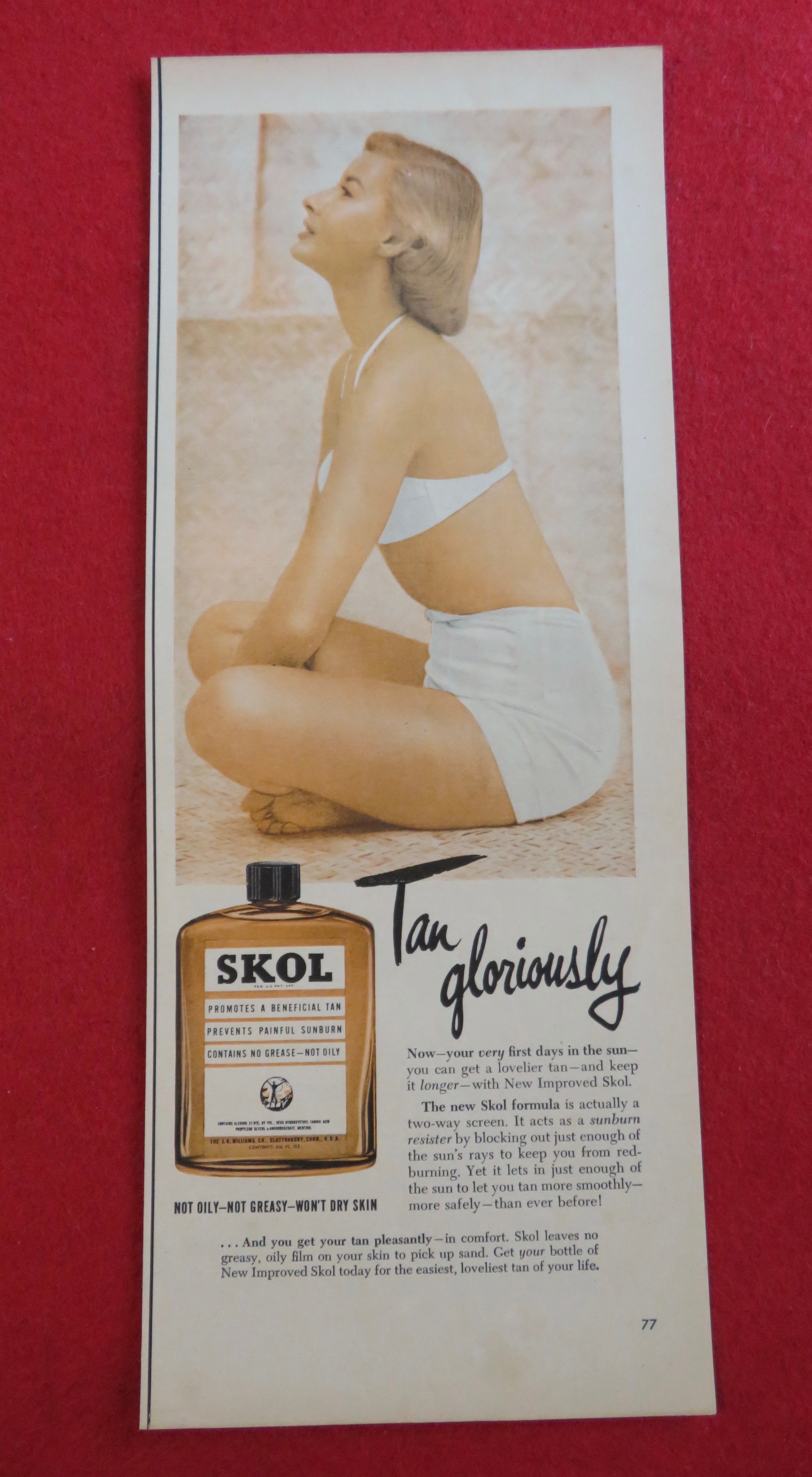1951 Skol Tan Lotion with Woman Sitting In Swimsuit
