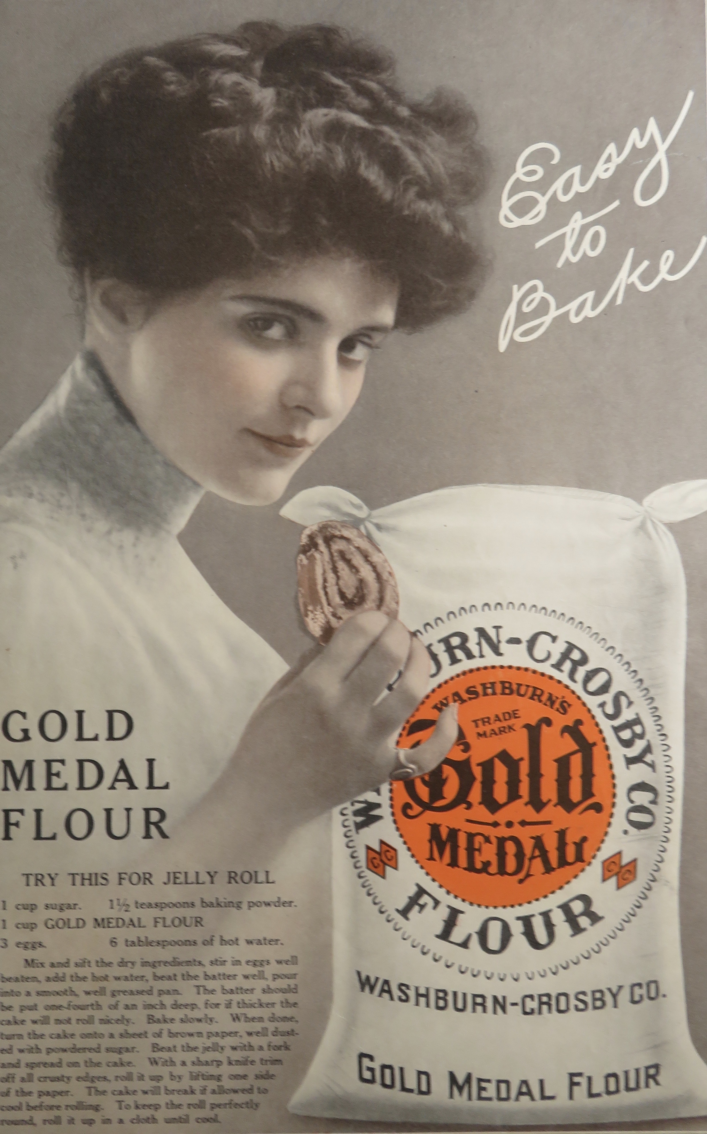 1913 Gold Medal Flour with Woman Holding Jelly Roll