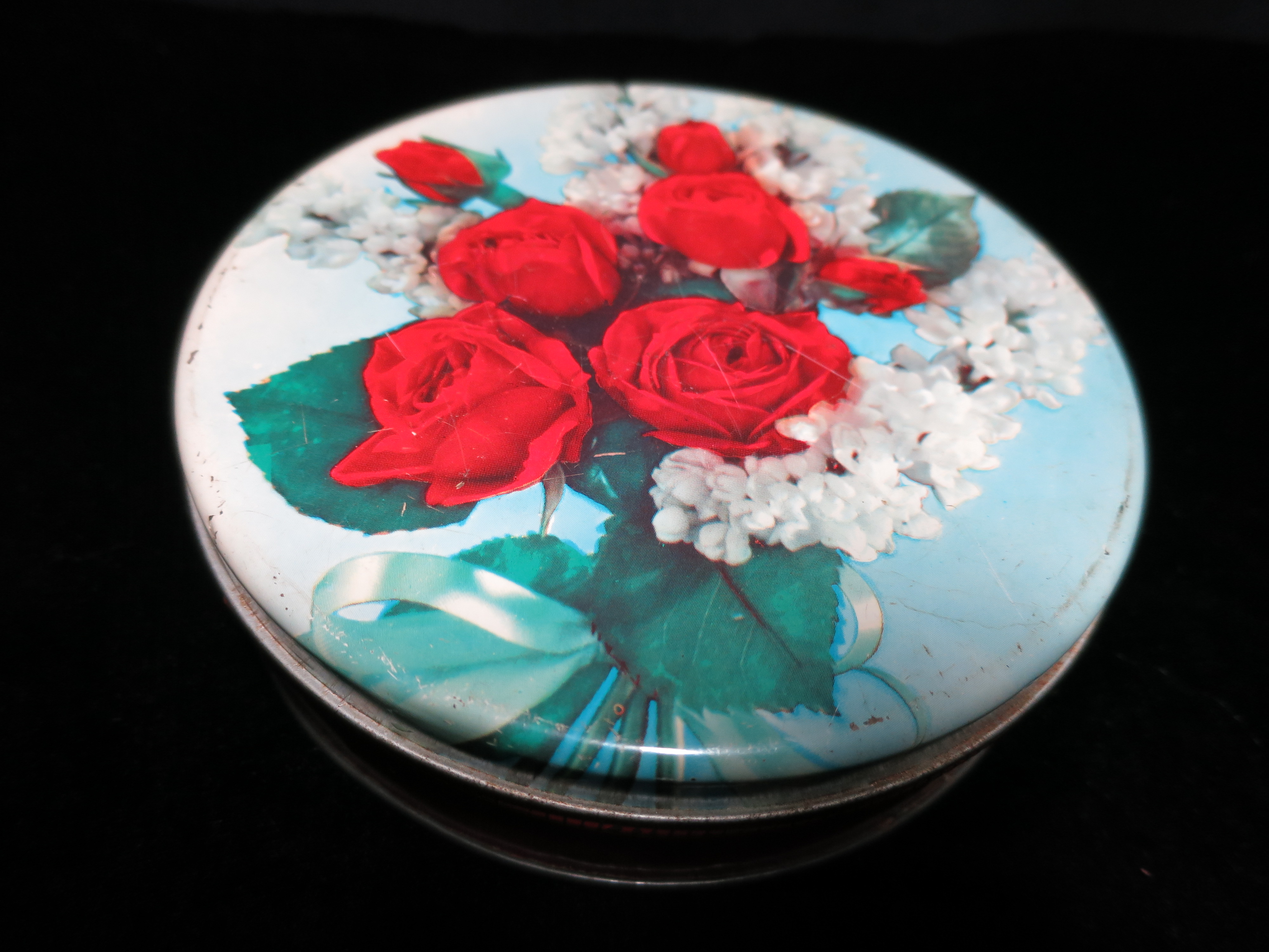 Rose round tin confections candy