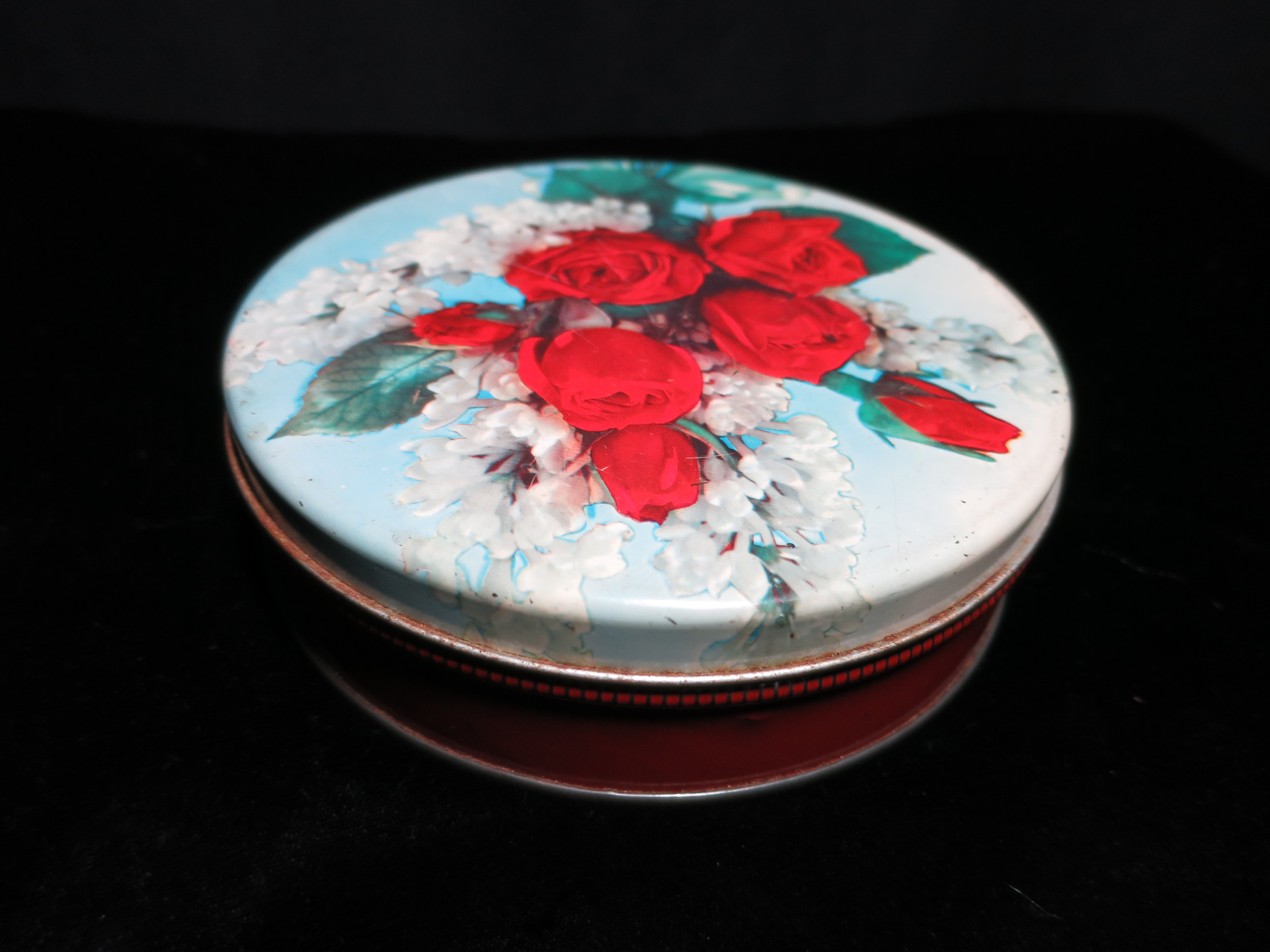Rose round tin confections candy