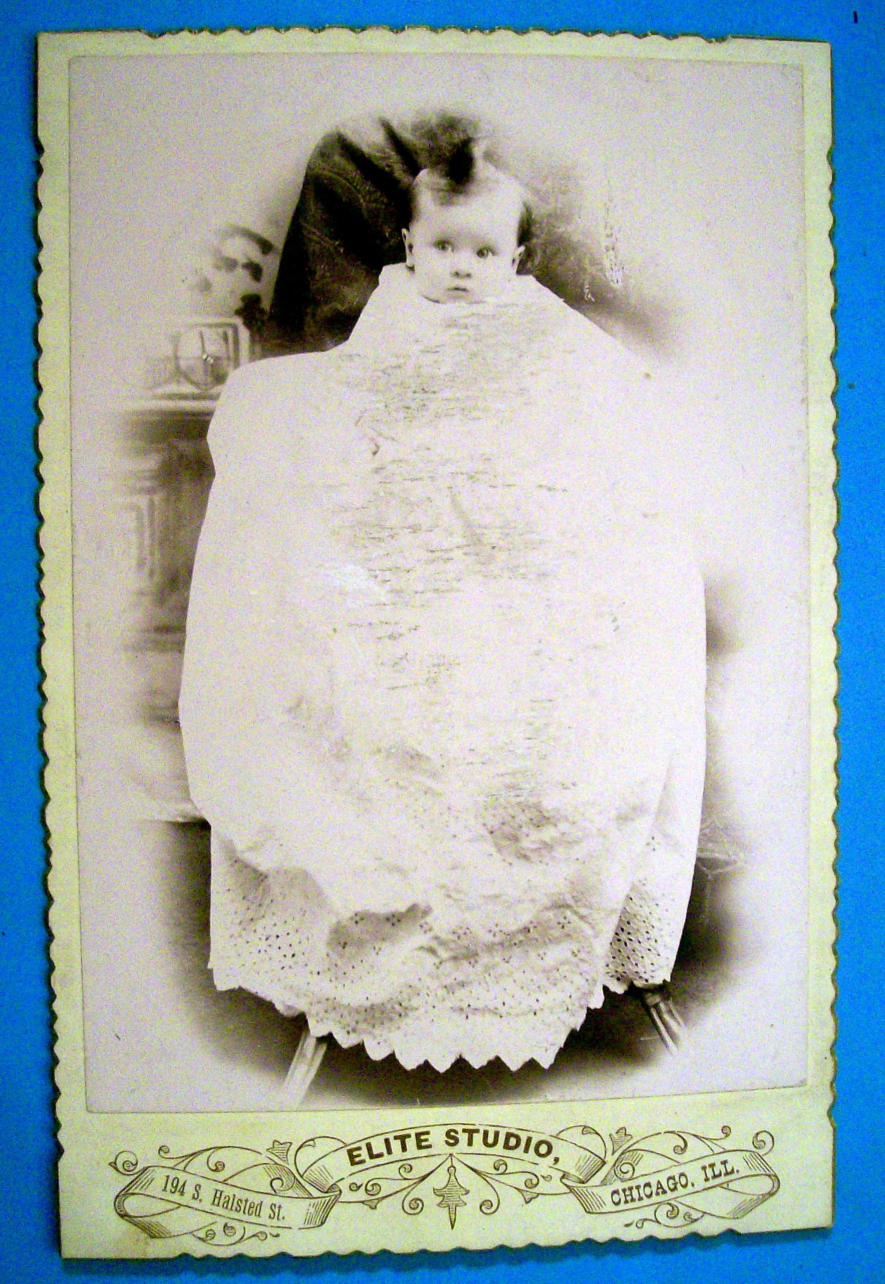 Peek A Boo - Die Cut Cabinet Photo of a Baby