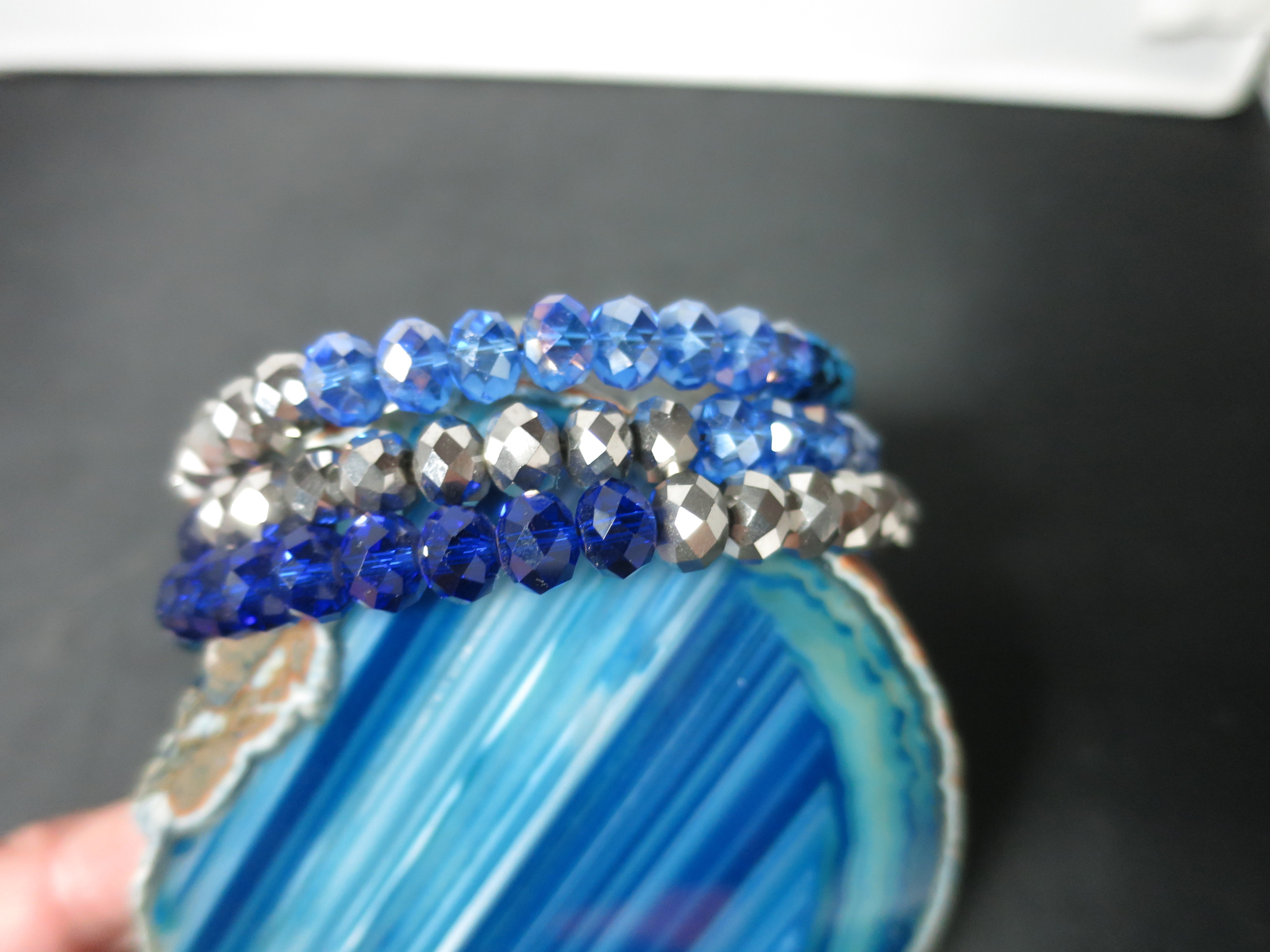 Crystal Bead Coil Bracelet Shades of Blue and Silver Bevel Cut