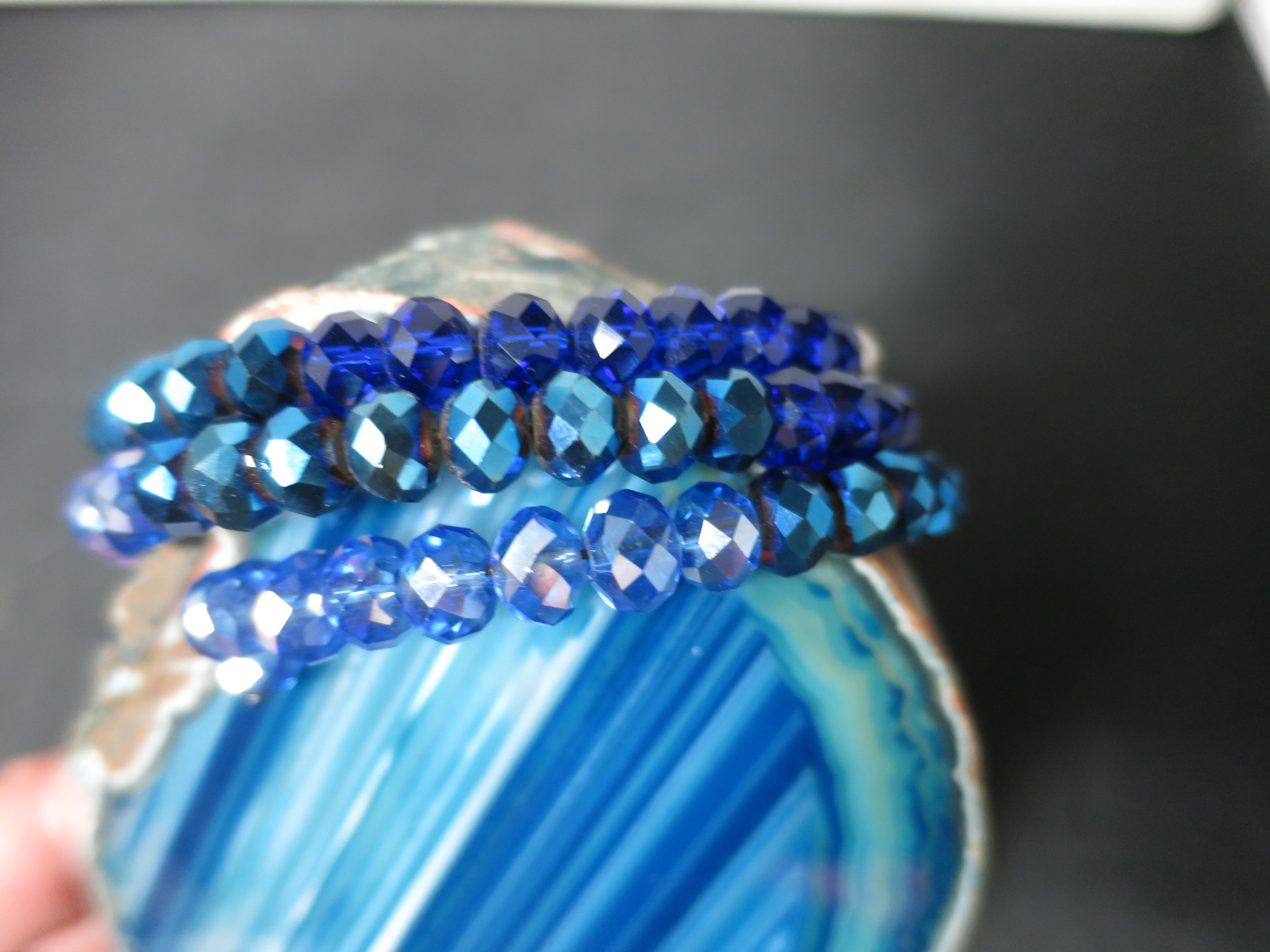 Crystal Bead Coil Bracelet Shades of Blue and Silver Bevel Cut