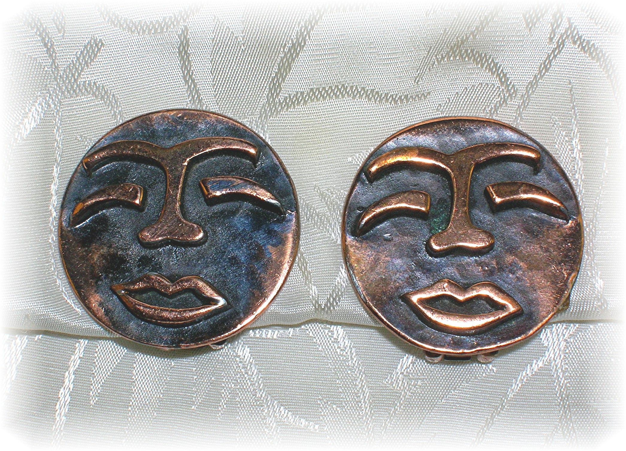 Signed Copper REBAJE Copper Face Clip Earrings
