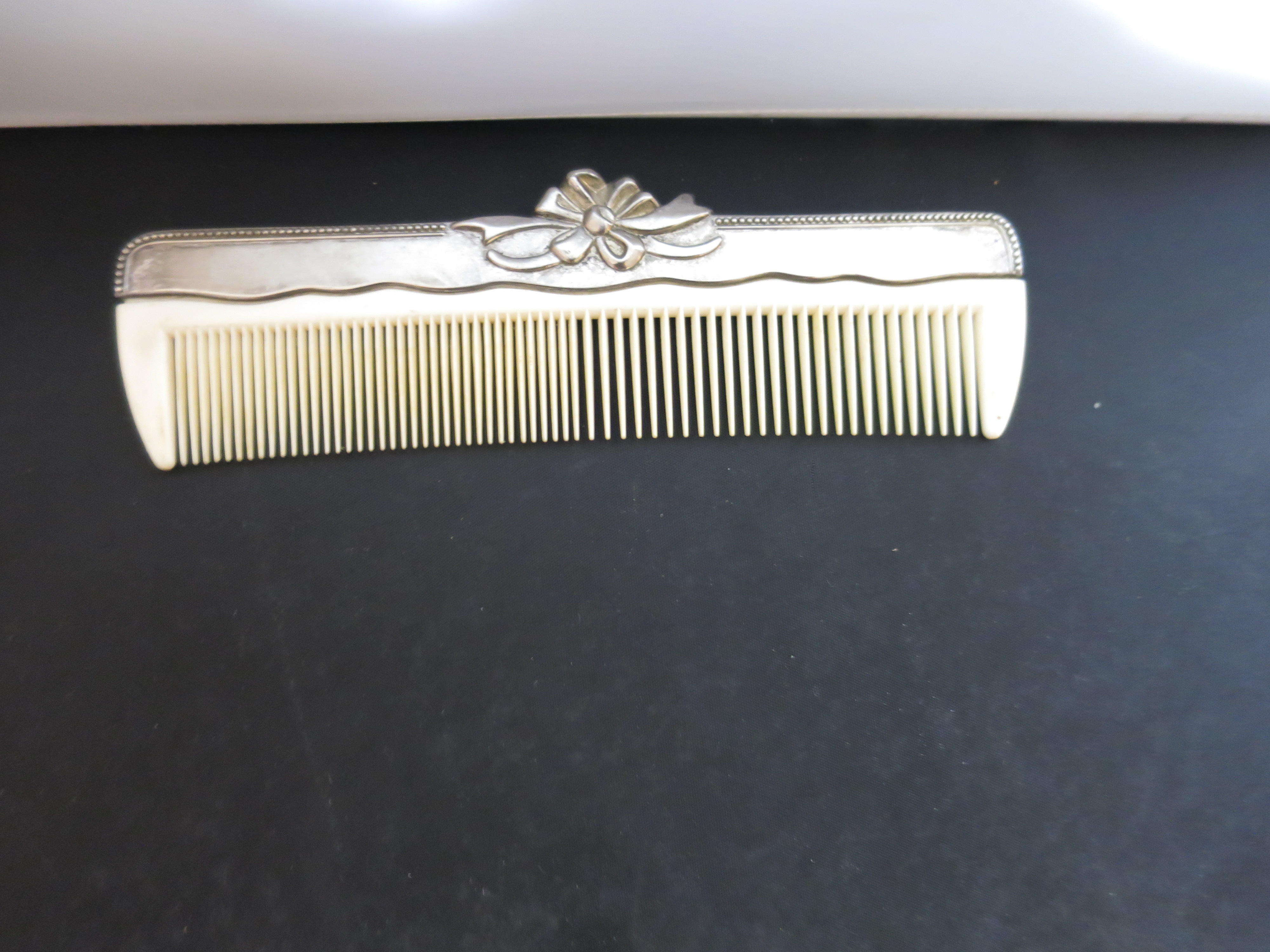 Silver Plated Comb with lucite plastic teeth Floral Ribbon ornate