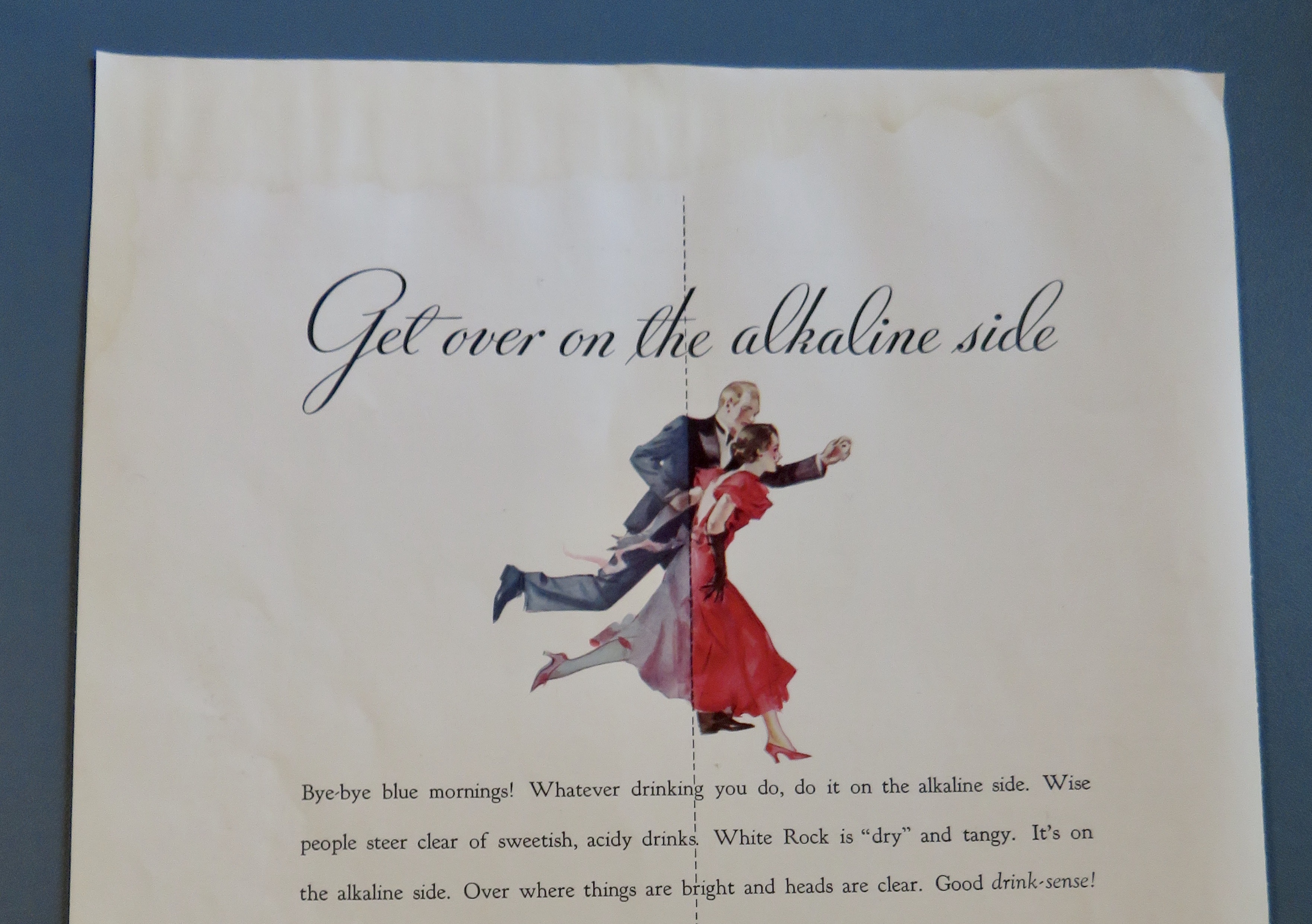 1933 White Rock Water with Man & Woman Running