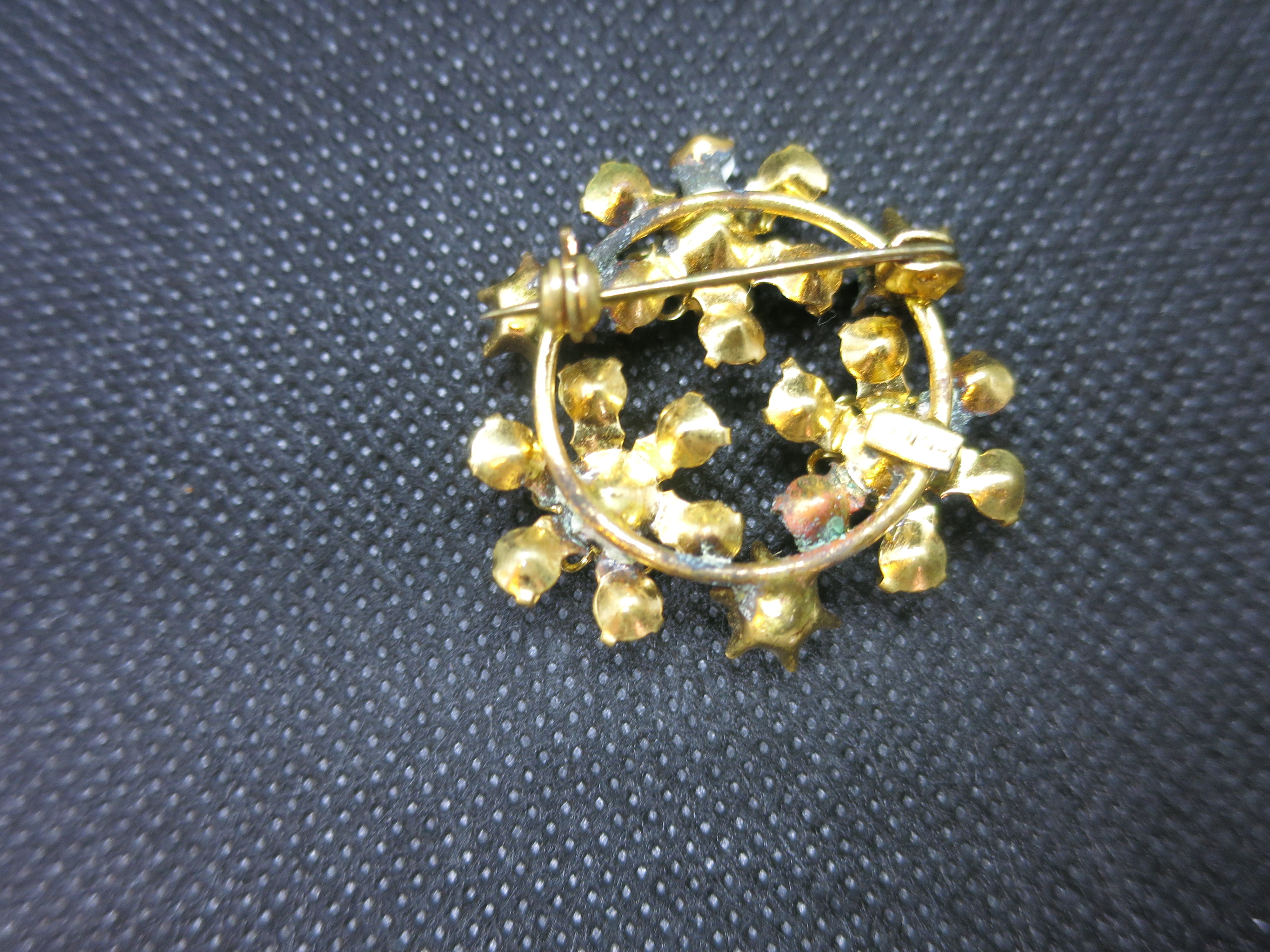 Floral Star Rhinestone Pin Signed Gold Tone