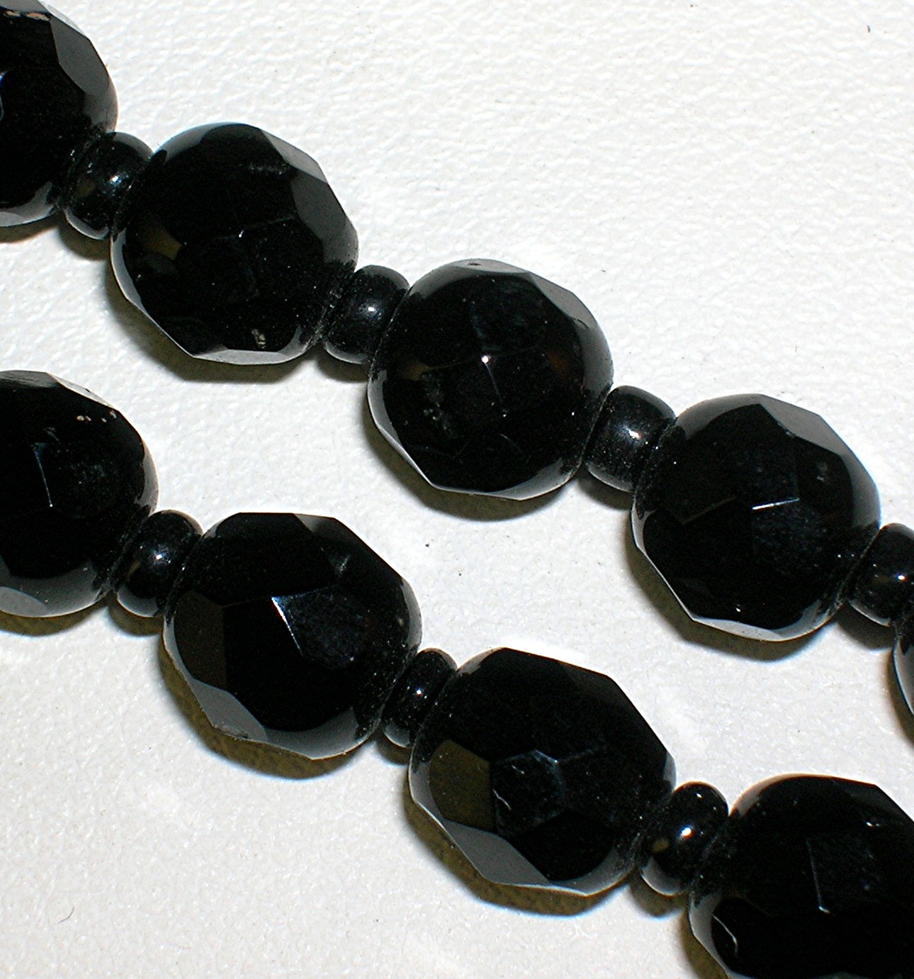 Double Row Of Faceted Jet/Glass Beads